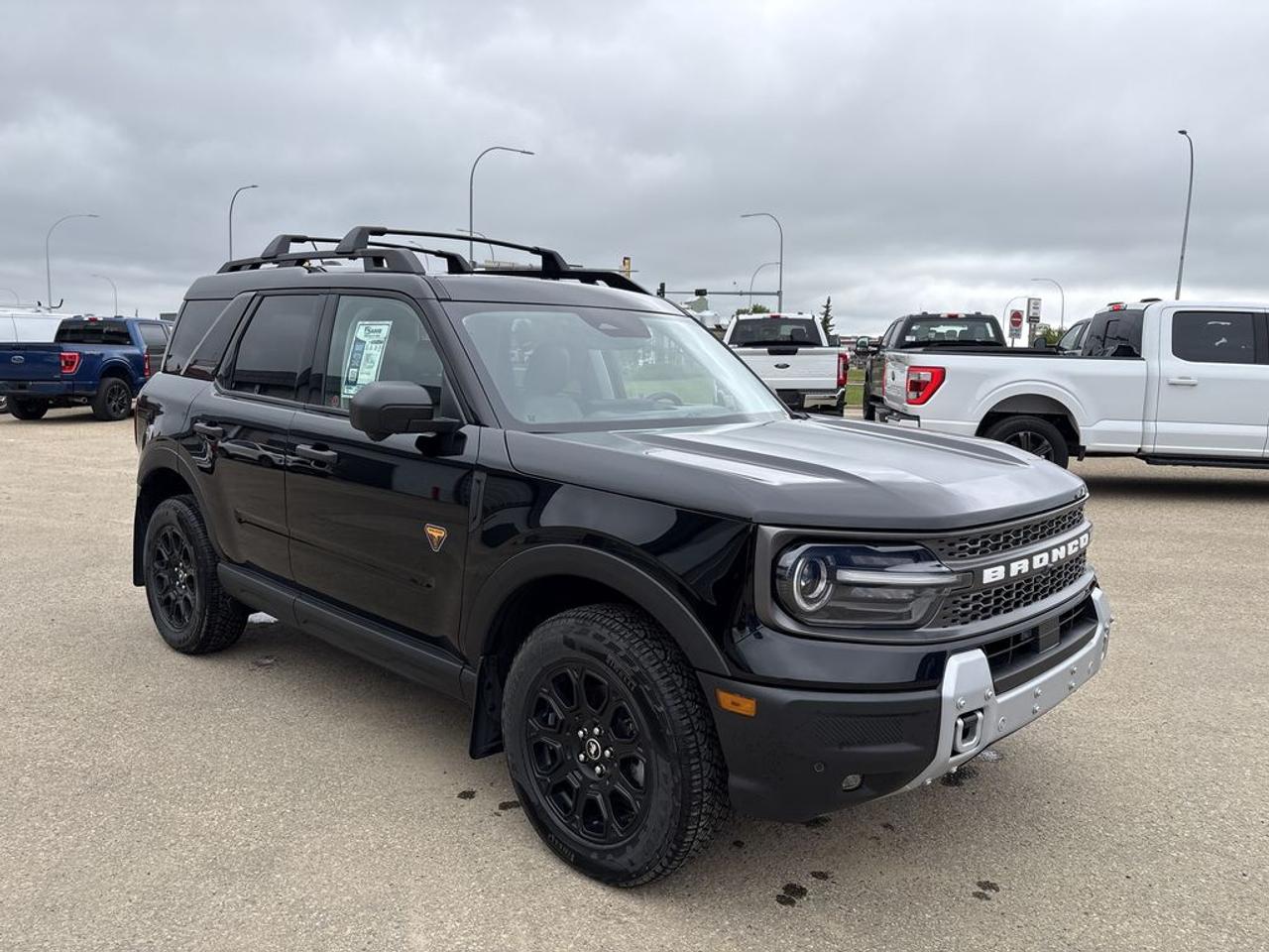 Ford Blue Advantage.  Rates from 5.09% to 5.89% available.  Comes with Blue Plan - additional 6 / 10,000KM PreimiumCare ESP, SiriusXM 3 Month Activation, Connected Services Trial 90 days, 10,000 Ford Rewards Points, Full tank of Fuel.THE PRICE YOU SEE, PLUS GST. GUARANTEED!2.0 LITER ECOBOOST, 8 SPEED AUTO, BADLANDS TRIM(400a), DARK SPACE GREY CLOTH SEATING, HEATED FRONT SEATS, BADLAND TECK PKG, POWER MOONROOF, FORD PASS CONNECT, TERRAIN MANAGEMENT SYSTEM W/G.O.A.T. MODES, TRAIL CONTROL, 13.2 LCD TOUCHSCREEN.     The 2025 Ford Bronco Sport Badlands with the 2.0-liter EcoBoost engine, the 400A package, and the Badlands Tech Package is a highly capable and rugged compact SUV designed for off-road adventures and outdoor exploration. The 2.0-liter EcoBoost turbocharged four-cylinder engine provides a robust balance of power and efficiency, delivering ample torque for challenging terrains and steep inclines, making it ideal for off-road enthusiasts. The 400A package typically includes a range of premium features such as upgraded interior materials, advanced infotainment options, and comfort enhancements like heated seats and a premium sound system, elevating the overall driving experience. The Badlands Tech Package enhances the vehicles off-road capabilities with features such as off-road driving modes, skid plates, and a terrain management system that optimizes performance on dirt, mud, and rocky trails. It also includes tech-savvy amenities like a larger touchscreen display, navigation, and driver-assistance features to provide both convenience and safety. Overall, this setup makes the 2025 Ford Bronco Sport Badlands a rugged yet refined vehicle, combining trail-ready off-road features with modern technology and comfort for drivers who seek adventure without sacrificing everyday usability.Do you want to know more about this vehicle, CALL, CLICK OR COME ON IN!*AMVIC Licensed Dealer; CarFax and Full Mechanical Inspection Included.