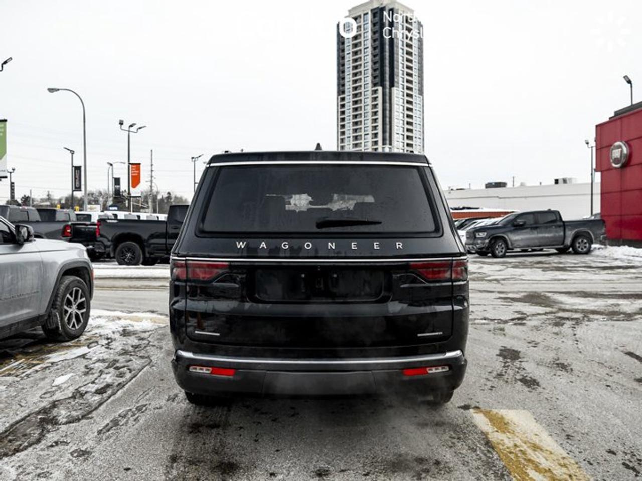 2022 Jeep Wagoneer Series II RearSeat Entertainment Group passenger interactive display Photo