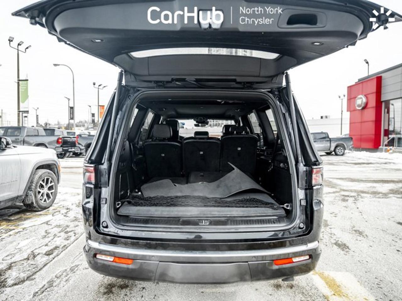 2022 Jeep Wagoneer Series II RearSeat Entertainment Group passenger interactive display Photo