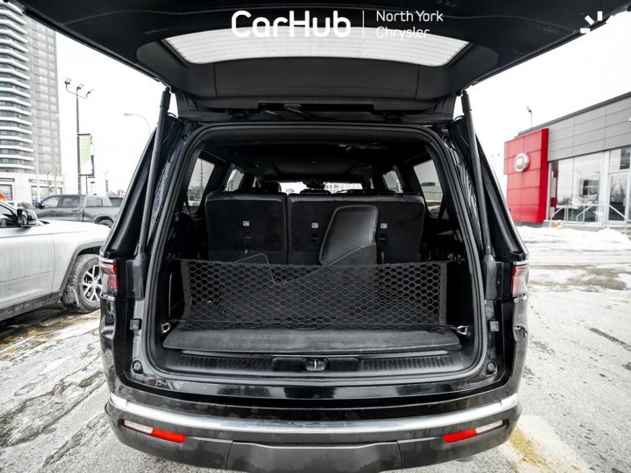 2022 Jeep Wagoneer Series II RearSeat Entertainment Group passenger interactive display Photo