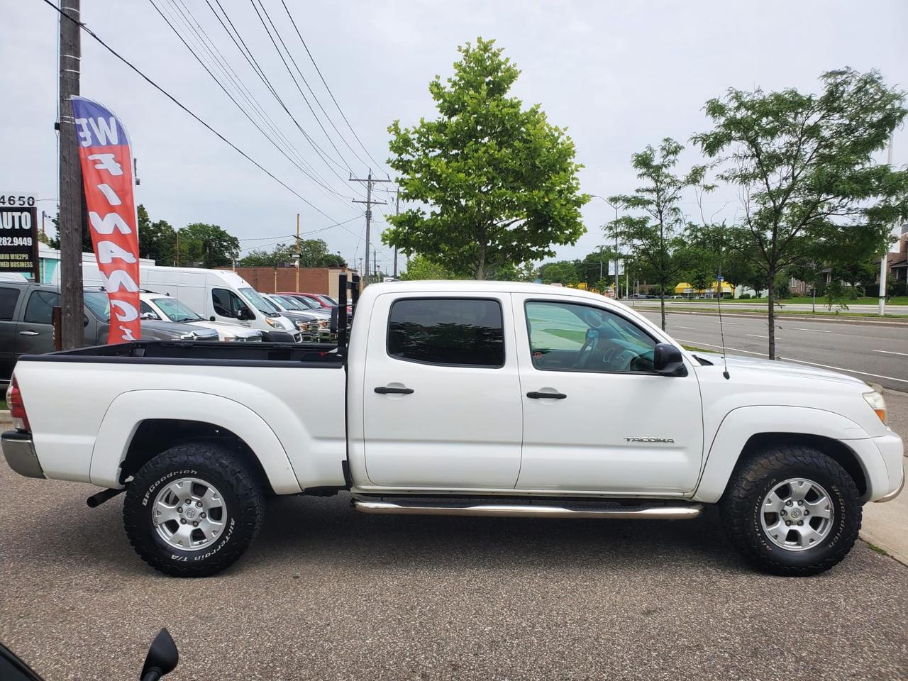 2011 Toyota Tacoma Double Cab Long Bed V6 Auto 4WD Photo