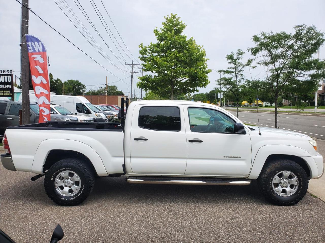 2011 Toyota Tacoma Double Cab Long Bed V6 Auto 4WD Photo