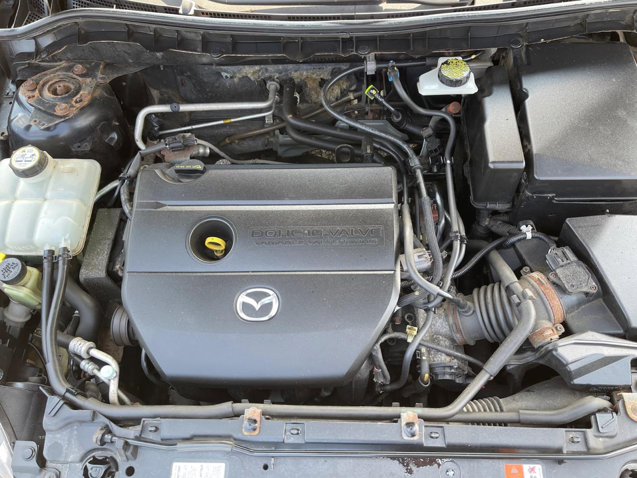 2013 Mazda MAZDA3 i Sport AUT 4-Door Photo