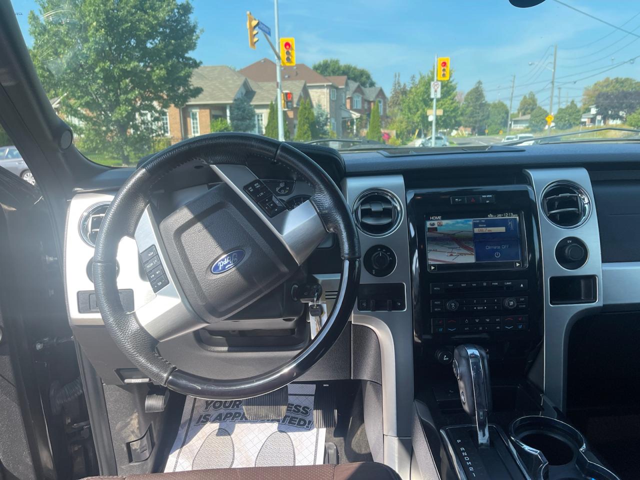 2012 Ford F-150 LARIAT STEPSIDE Platinum SuperCrew 5.5-ft. Bed 4WD Photo