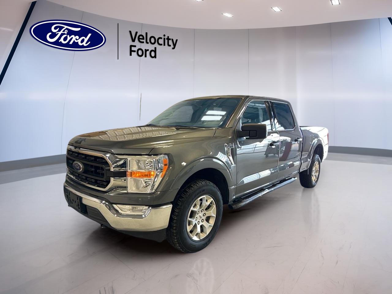 // SINGLE OWNER! //

Meet the 2022 Ford F-150 XLT SuperCrew 6.5 Box, now available at Velocity Ford in Moose Jaw. Finished in grey with a dark grey interior, this 4-door truck is built for real work and real life. CARFAX Canada reports a single owner, and it shows in how well it presents.

With 99,793 km, this 2022 Ford F-150 XLT SuperCrew 6.5 Box is ready for the next chapter. You get a 3.5 L gas engine paired with an automatic transmission, plus confident Four-Wheel Drive (4WD) for changing road and weather conditions. Its a smart pick for drivers who need capability without giving up comfort.

TRUCK FEATURES  
»» Towing capacity rated at 4,671 kg  
»» Four-Wheel Drive for tough conditions  
»» Rear tow hook for recovery help  
»» Off-road tires for added traction  

ADVANCED SAFETY FEATURES  
»» Anti-Lock Braking System helps maintain control  
»» Stability Control supports confident handling  
»» Side impact airbags for added protection  
»» Blind Spot Monitor for safer lane changes  

PERFORMANCE AND EFFICIENCY  
»» 3.5 L gas engine power  
»» Automatic transmission with dual shift mode  
»» Power steering for easy low-speed turns  
»» Four-Wheel Drive for confident traction  

COMFORT AND CONVENIENCE  
»» Front air conditioning for cabin comfort  
»» Cruise control for relaxed highway driving  
»» Power windows for quick adjustments  
»» Adjustable steering wheel for better fit  

TECHNONOLGY AND CONNECTIVITY  
»» Navigation system helps plan every route  
»» Bluetooth integration for hands-free calling  
»» WiFi hotspot keeps devices connected  
»» Satellite radio for more listening choice  

CARGO SPACE  
»» 6.5-foot box for longer cargo  
»» Rear trunk access for easier loading  
»» Spare tire onboard for peace of mind  
»» Tinted windows help protect stored items  

WHAT OTHER OWNERS LIKE  
»» Strong towing confidence for weekend jobs  
»» Easy-to-use infotainment and phone pairing  
»» Stable ride feel on rough roads  
»» Helpful driver aids for daily commuting  

This 2022 Ford F-150 XLT SuperCrew 6.5 Boxs VIN is: 1FTFW1E83NKD13987.