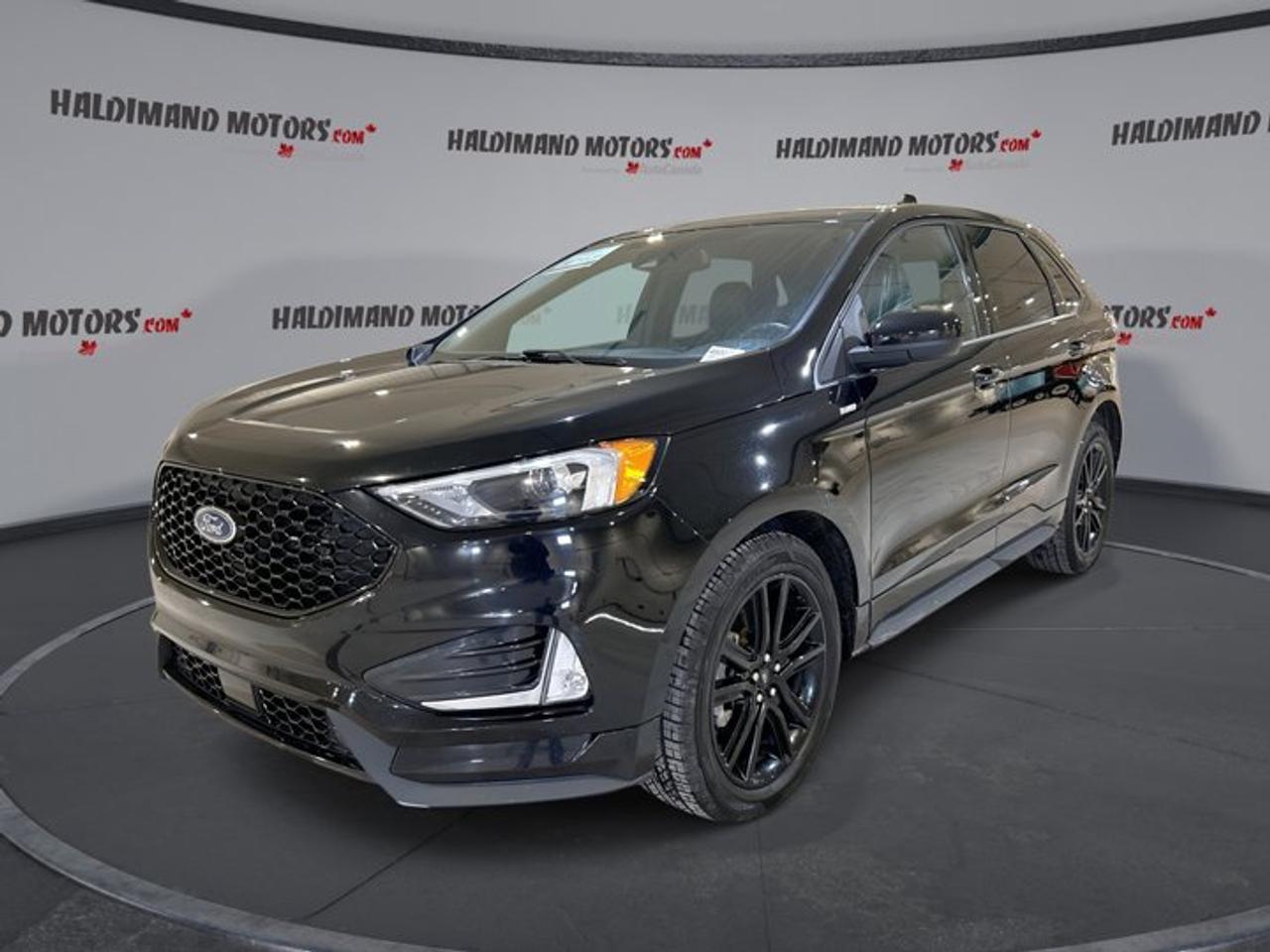 // ACCIDENT FREE!! //<br /><br />Meet the 2024 Ford Edge SEL AWD, a smart choice for Cayuga drivers who want comfort, confidence, and everyday versatility. Finished in Black on Black, this 4-door SUV blends a clean look with practical features. With 70,544 km, it is ready for more Ontario kilometres.<br /><br />At Haldimand Motors Ltd., we know an SUV has to fit real life. The 2024 Ford Edge SEL AWD delivers with all-wheel drive for changing weather, an automatic 8-speed transmission for smooth response, and a 2.0-litre gas engine designed for balanced power and efficiency.<br /><br />FEATURES OF THE Edge SEL AWD | Remote Start | Panoramic Sunroof | Leather Seats <br />   Remote starter for winter-ready getaways <br />   Panoramic sunroof for open-air drives <br />   All-wheel drive for four-season confidence <br />   Power liftgate for easier loading<br /><br />ADVANCED SAFETY FEATURES <br />   Anti-lock braking system for controlled stops <br />   Stability control helps maintain steady handling <br />   Blind spot monitor for safer lane changes <br />   Lane departure warning adds extra awareness<br /><br />PERFORMANCE AND EFFICIENCY <br />   2.0-litre gas engine for daily driving <br />   Automatic 8-speed transmission shifts smoothly <br />   All-wheel drive for added traction <br />   Limited slip differential for improved grip<br /><br />COMFORT AND CONVENIENCE <br />   Dual-zone automatic climate control for comfort <br />   Heated front seats for cold mornings <br />   Heated steering wheel for winter commutes <br />   Power driver seat with lumbar support<br /><br />TECHNONOLGY AND CONNECTIVITY <br />   Apple CarPlay for familiar smartphone access <br />   Android Auto for seamless app integration <br />   Bluetooth integration for hands-free calling <br />   WiFi hotspot for connected passengers<br /><br />CARGO SPACE <br />   Power liftgate for quick rear access <br />   Remote trunk release adds everyday ease <br />   Rear trunk access for simple loading <br />   Spare tire included for added preparedness<br /><br />WHAT OTHER OWNERS LIKE <br />   Confident all-wheel drive in poor weather <br />   Comfortable ride for daily commuting <br />   Easy phone pairing and simple controls <br />   Helpful driver-assist features for highways<br /><br />This Edge is also well equipped for day-to-day driving with cruise control, power steering, power windows, and an adjustable steering wheel with audio controls. You also get satellite radio for more listening choice, plus tinted windows and ambient lighting to set the mood on evening drives.<br /><br />For visibility and confidence in tight spots, this 2024 Ford Edge SEL AWD includes a backup camera, automatic headlights, LED headlamps, and heated mirrors. Adaptive cruise control helps take stress out of longer highway stretches, while tire pressure monitoring keeps you informed as road conditions change.<br /><br />This 2024 Ford Edge SEL AWD | Remote Start | Panoramic Sunroof | Leather Seatss VIN is: 2FMPK4J99RBB09979.<br /><br />WHY CHOOSE US? <br /><br />Honest & Transparent Buying Experience: Weve been a trusted name in business since 1984.<br /><br />STRAIGHTFORWARD PRICING:<br />Our Advertised Price Includes:<br />>>Safety Certification (No separate fee!)<br />>>30-Day 100% Mechanical Warranty<br />>>FREE Carfax History Report.<br />>>No upcharge for paying cash.<br />(Prices Exclude HST and Licensing Fees only.)<br /><br />>>Browse 300+ vehicles all in ONE LOCATION<br /><br />EASY FINANCING: Great rates & open loans<br /><br />WE BUY CARS: Get Top Dollar for your trade-in, or sell us your vehicle for CASH! Even if you dont buy from us!<br /><br />STOP BY TODAY<br />Treat yourself - stop by Haldimand Motors Ltd. located at 42 Talbot St E, Cayuga, ON N0A 1E0 to make this car yours today!<br /><br />https://www.haldimandmotors.com/used/stock-460075.html