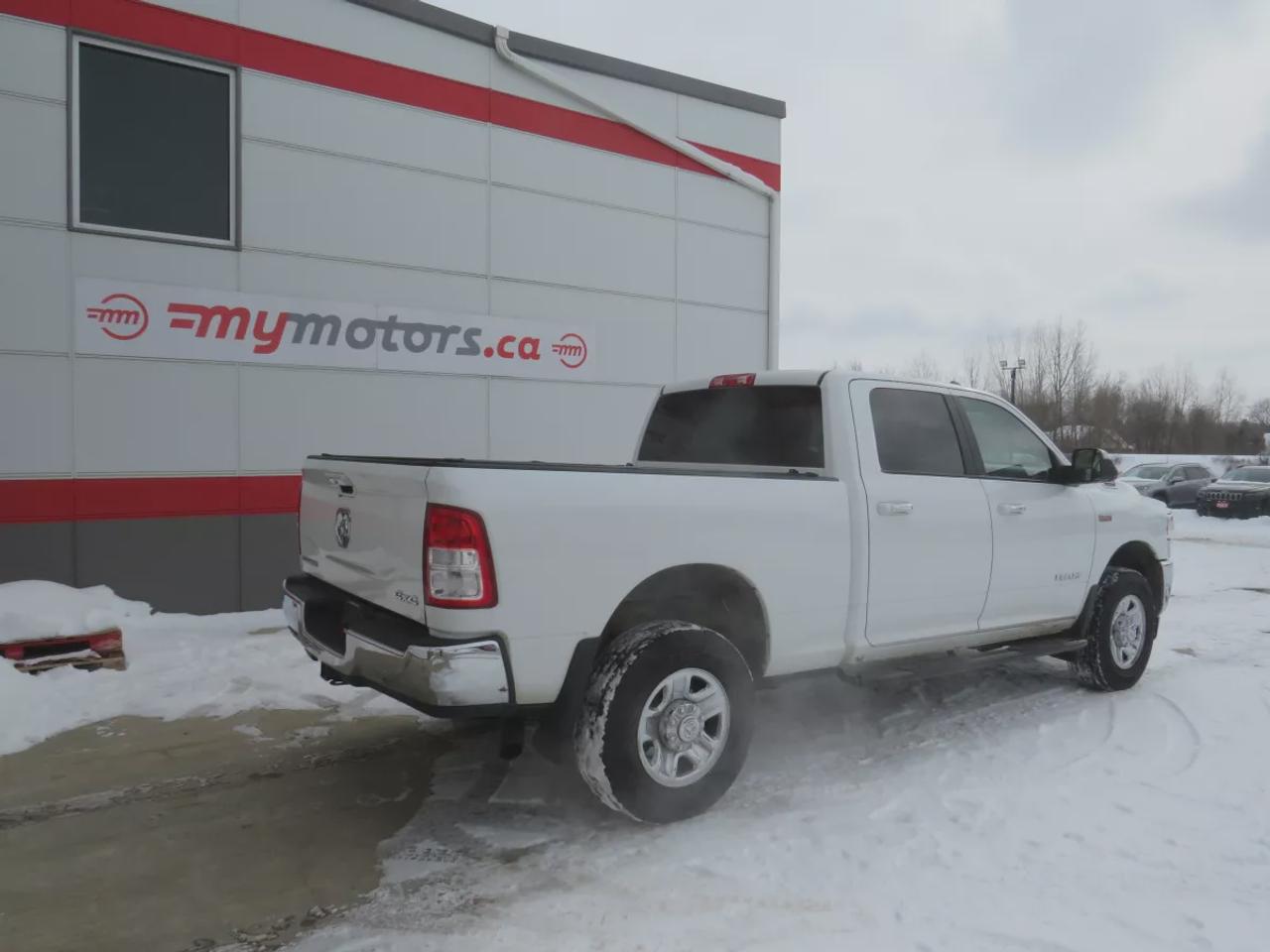 2019 RAM 2500 Big Horn  | Clean Title | No Accidents | 4WD | Alloy Rims | Running Boards | Trailer Hitch | Power Seats | Digital Touchscreen | Push Button Start | Bluetooth | Cruise Control Photo