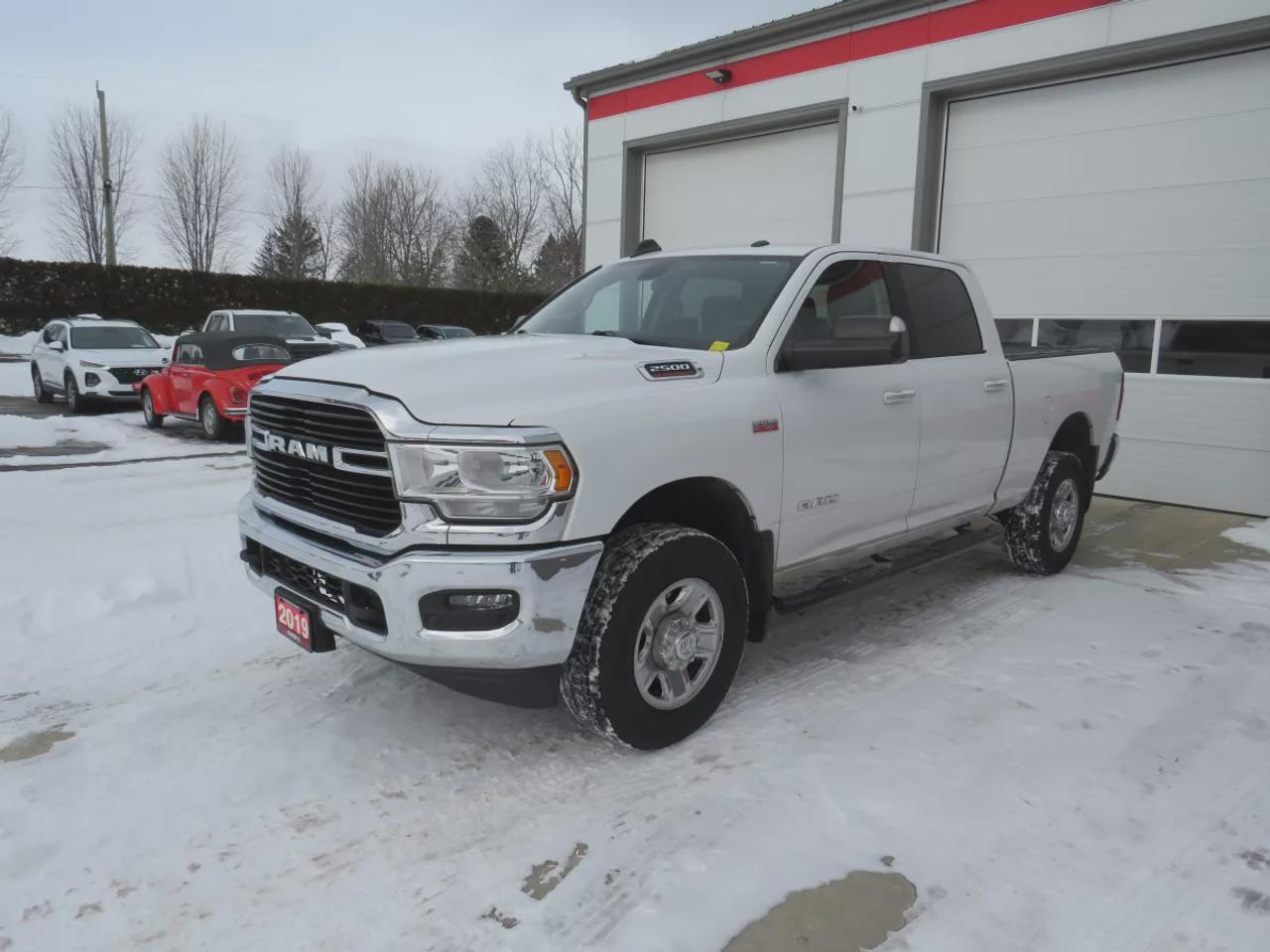 2019 RAM 2500 Big Horn  | Clean Title | No Accidents | 4WD | Alloy Rims | Running Boards | Trailer Hitch | Power Seats | Digital Touchscreen | Push Button Start | Bluetooth | Cruise Control Photo
