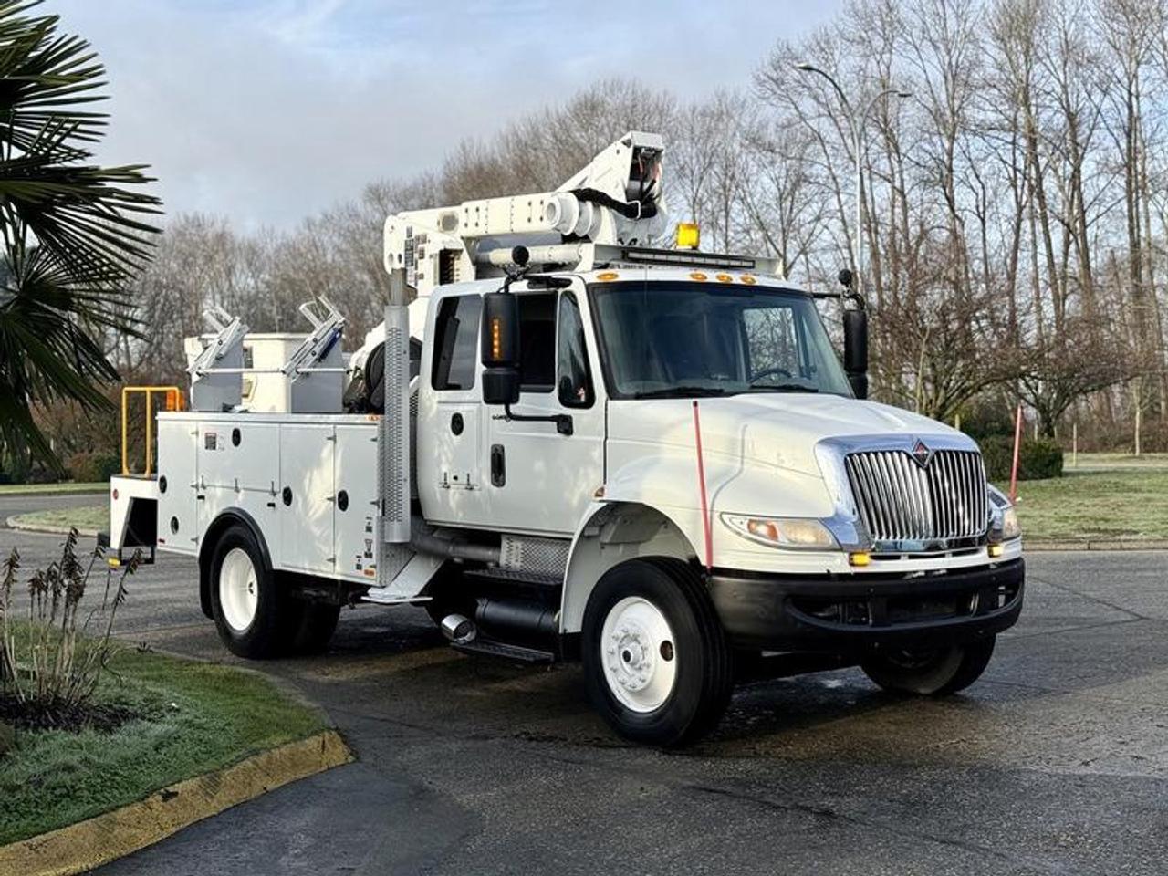 This 2013 International Durastar 4300 bucket truck is powered by a 7.6L inline-6 with an automatic transmission and 4x2 drivetrain, and is equipped with air brakes for commercial operation. It features an Altec AT40P bucket with a 40-foot platform height and a 600 lb platform capacity, along with outriggers, strobe lights, and a traffic arrow control panel. Additional equipment includes storage compartments, air-assisted seats for both driver and passenger, cruise control, air conditioning and heat, AM/FM radio, cup holders, and power windows and door locks. Finished in white with a grey cloth interior, this truck measures approximately 27 feet long, 8 feet 1 inch wide, and 12 feet 1 inch high, making it well suited for utility, service, or fleet use. This item is currently OFFSITE. You must register an appointment with our office to schedule an offsite viewing. Appointments must be made a minimum of one business day in advance (and as defined by the days that Repo.com is open for business) before your appointment can be scheduled and confirmed. We may, at our own discretion, instead opt to transport smaller items to Repo.coms main yard for viewing purposes.  $49,720.00 plus $375 processing fee, $50,095.00 total payment obligation before taxes.   Listing report, warranty, contract commitment cancellation fee, financing available on approved credit (some limitations and exceptions may apply). All above specifications and information is considered to be accurate but is not guaranteed and no opinion or advice is given as to whether this item should be purchased. We do not allow test drives due to theft, fraud, acts of vandalism and undetectable impaired driving. Instead we provide the following benefits: Complimentary Warranty (with options to extend), Limited Money Back Satisfaction Guarantee on Fully Completed Contracts, Contract Commitment Cancellation, and an Open-Ended Sell-Back Option. Ask seller for details or call 604-522-REPO(7376) to confirm listing availability.