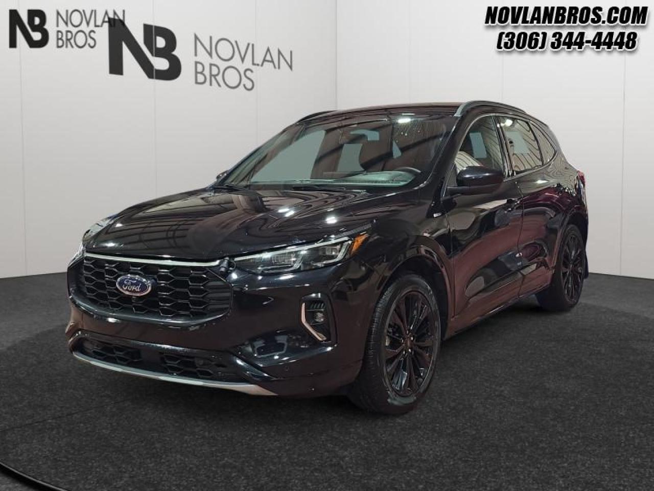 <b>Heated Seats, Alloy Wheels, Power Trunk, Reverse Sense System, Rear View Camera!</b><br> <br> Check out our great inventory of pre-owned vehicles at Novlan Brothers!<br> <br>In the city or in the forest, this Ford Escape is built to get you over any terrain with confidence and comfort. This 2023 Ford Escape is fresh on our lot in Paradise Hill. <br> <br>This Ford Escape was built for an active lifestyle and offers plenty of options for you to hit the road in your own individual style. Whether you need a family SUV for soccer practice, a capable adventure vehicle, or both, the versatile Ford Escape has you covered. Built for those who live on the go, the 2023 Ford Escape is made to be unstoppable. This SUV has 116,194 km. Its Agate Black in colour. It has a CVT transmission and is powered by a 192HP 2.5L 4 Cylinder Engine. <br> <br> Our Escapes trim level is ST-Line Elite. This range-topping ST-Line Elite features sport-tuned suspension and unique exterior styling, with upgrades such as inbuilt navigation, adaptive cruise control, Ford Co-Pilot360 surround camera, and evasive steering assist. The amazing standard features continue with heated ActiveX synthetic leather seats, a heated leatherette steering wheel, simulated wood interior trim, remote engine start, and an expansive 13.2-inch infotainment screen with wireless Apple CarPlay and Android Auto, SiriusXM satellite radio, and FordPass Connect 4G mobile hotspot internet access. Safety features include blind spot detection, lane keeping assist with lane departure warning, evasive steering assist, forward and rear collision mitigation, and front and rear parking sensors. Additional features include a power liftgate for rear cargo access, aluminum wheels, roof rack rails, LED headlights with automatic high beams, a keypad for extra security, and so much more. This vehicle has been upgraded with the following features: Heated Seats, Alloy Wheels, Power Trunk, Reverse Sense System, Rear View Camera, Remote Engine Start, Traction Control.<br> To view the original window sticker for this vehicle view this <a href=http://www.windowsticker.forddirect.com/windowsticker.pdf?vin=1FMCU9PZ6PUA21699 target=_blank>http://www.windowsticker.forddirect.com/windowsticker.pdf?vin=1FMCU9PZ6PUA21699</a>. <br/><br> <br>To apply right now for financing use this link: <a href=http://novlanbros.com/credit/ target=_blank>http://novlanbros.com/credit/</a><br><br> <br/><br>The Novlan family is owned and operated by a third generation and committed to the values inherent from our humble beginnings.<br> Come by and check out our fleet of 20+ used cars and trucks and 30+ new cars and trucks for sale in Paradise Hill.  o~o