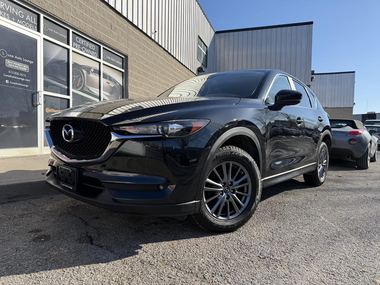 <p>WHAT A GREAT DEAL!!! This 2017 Mazda CX5 AWD is a CLEAN, ONE-OWNER, DEALER-SERVICED vehicle!! Where else can you find a well-optioned, all wheel drive, Japanese vehicle for under 20 grand!!?? At Luxe Auto Lounge of course!! Over 100 certified pre-owned vehicles always in stock!! Features include: power group, leather/suede interior, power driver seat, heated seats, heated steering wheel, power sunroof, navigation, back-up camera, bluetooth hands-free and more!!!</p><p><span style=color: #333333; font-family: Work Sans, sans-serif; font-size: 16px; white-space: pre-wrap; caret-color: #333333; background-color: #ffffff;>This vehicle comes Luxe certified select pre-owned, which includes: 100-point inspection & servicing, oil lube and filter change, Ontario safety certificate, Available Luxe Assurance Package, complete interior and exterior detailing, Carfax Verified vehicle history report, guaranteed one key (additional keys may be purchased at time of sale) and FREE 90-day SiriusXM satellite radio trial (on factory-equipped vehicles)! </span><span style=background-color: #ffffff; color: #333333; font-family: Work Sans, sans-serif; font-size: 16px; caret-color: #333333; white-space-collapse: preserve;>Remember, we built our business on quality, trust, service, and we deliver. PERIOD. <strong>**<em>Ask about our U-select Standard Plus Extended Powertrain Warranty Covearge!!**</em> </strong></span><span style=background-color: #ffffff; color: #333333; font-family: Work Sans, sans-serif; font-size: 16px; caret-color: #333333; white-space-collapse: preserve;><strong>Proudly </strong></span><strong><span style=background-color: #ffffff; color: #333333; font-family: Work Sans, sans-serif; font-size: 16px; caret-color: #333333; white-space-collapse: preserve;>Family Owned and Operated in the Orleans community for over 16 years!</span></strong></p><p><strong>Priced at ONLY $207 bi-weekly with $1500 down over 48 months at 7.99% (cost of borrowing is $1899 per $10000 financed) OR cash purchase price of $19995 (both prices are plus HST and licensing). Call today and make this Mazda CX5 yours!!!</strong></p>
