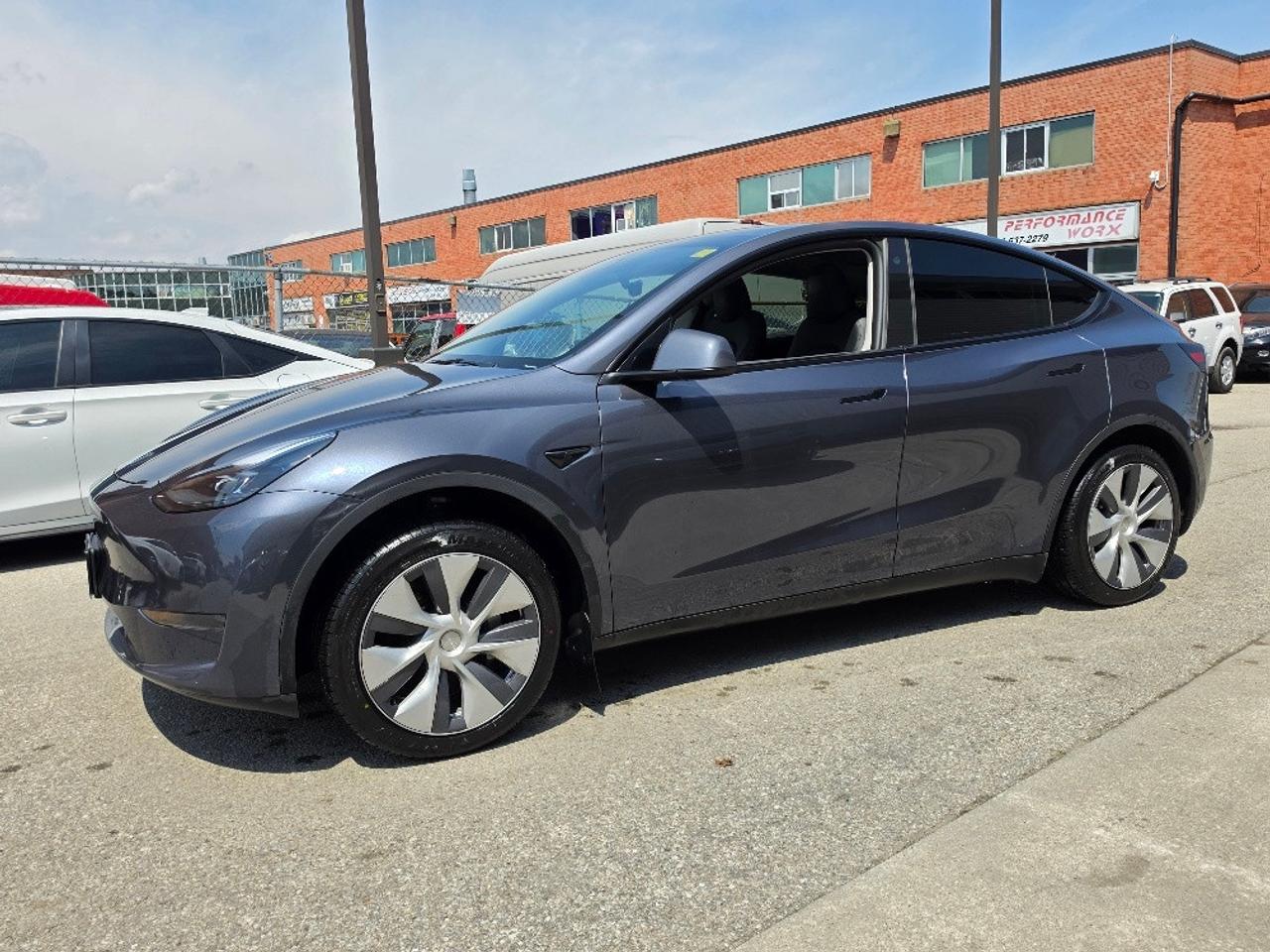 2023 Tesla Model Y LFP BATTERY CHARGE TO 100%-AUTOPILOT-TESLA WARRANTY Photo