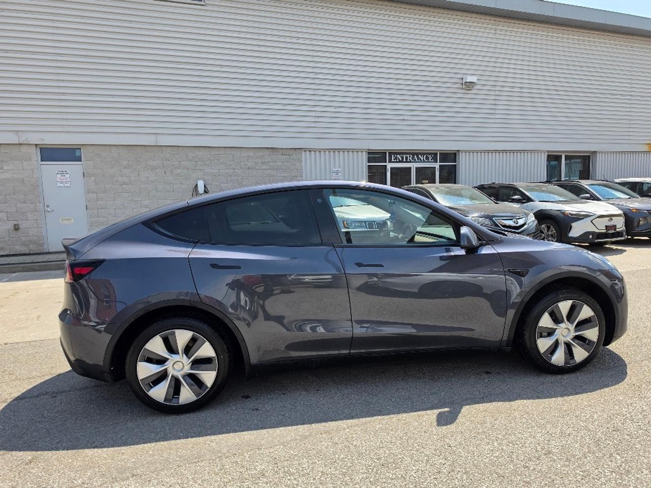 2023 Tesla Model Y LFP BATTERY CHARGE TO 100%-AUTOPILOT-TESLA WARRANTY Photo