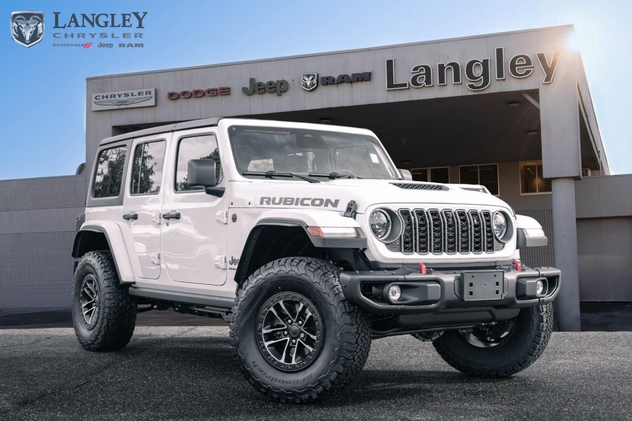 <p><strong>2026 Jeep Wrangler Rubicon 4-Door 4x4</strong></p><p>The 2026 Jeep Wrangler Rubicon continues to be the industry benchmark for off-road capability, featuring a rugged body-on-frame design and the legendary Rock-Trac® 4x4 system. This 4-door "Unlimited" model provides a spacious, tech-forward cabin while maintaining its iconic open-air freedom with removable doors and various roof configurations.</p><p></p><ul><li><p><strong>Engine</strong>: 3.6L Pentastar VVT V6 with Stop/Start (285 hp, 260 lb-ft torque)</p><p></p></li><li><p><strong>Drivetrain</strong>: Rock-Trac® HD Part-Time 4x4 with a 4:1 low-range ratio</p><p></p></li><li><p><strong>Capability</strong>: Tru-Lok® electronic locking front/rear differentials and electronic sway bar disconnect</p><p></p></li><li><p><strong>Max Towing</strong>: Up to 2,268 kg (5,000 lbs) when properly equipped with the automatic transmission</p><p></p></li><li><p><strong>Technology</strong>: 12.3-inch Uconnect® 5 touchscreen with wireless Apple CarPlay and Android Auto</p><p></p></li><li><p><strong>Key Features</strong>: 33-inch BFGoodrich® all-terrain tires, Dana® 44 wide heavy-duty axles, and LED headlamps</p><p></p></li></ul><p>Come book a test drive at Langley Chrysler, conveniently located in Langley, British Columbia.</p>*All new vehicle purchases are plus the PDI accessory installs and any price increases provided by the manufacturer. For trucks the accessories will include wheel locks, spray-in liners, and mud flaps. For all other vehicles, wheel locks are standard, other equipment may apply. Confirm with the dealer.

<p>*All prices are net of all manufacturer incentives and/or rebates and are subject to change by the manufacturer without notice. All prices plus applicable taxes, applicable environmental recovery charges, documentation of $599 and full tank of fuel surcharge of $76 if a full tank is chosen.<br />Other items available that are not included in the above price:<br />Tire & Rim Protection and Key fob insurance starting from $599<br />Service contracts (extended warranties) for up to 7 years and 200,000 kms starting from $599<br />Custom vehicle accessory packages, mudflaps and deflectors, tire and rim packages, lift kits, exhaust kits and tonneau covers, canopies and much more that can be added to your payment at time of purchase<br />Undercoating, rust modules, and full protection packages starting from $199<br />Flexible life, disability and critical illness insurances to protect portions of or the entire length of vehicle loan?im?im<br />Financing Fee of $500 when applicable<br />Prices shown are determined using the largest available rebates and incentives and may not qualify for special APR finance offers. See dealer for details. This is a limited time offer.</p>