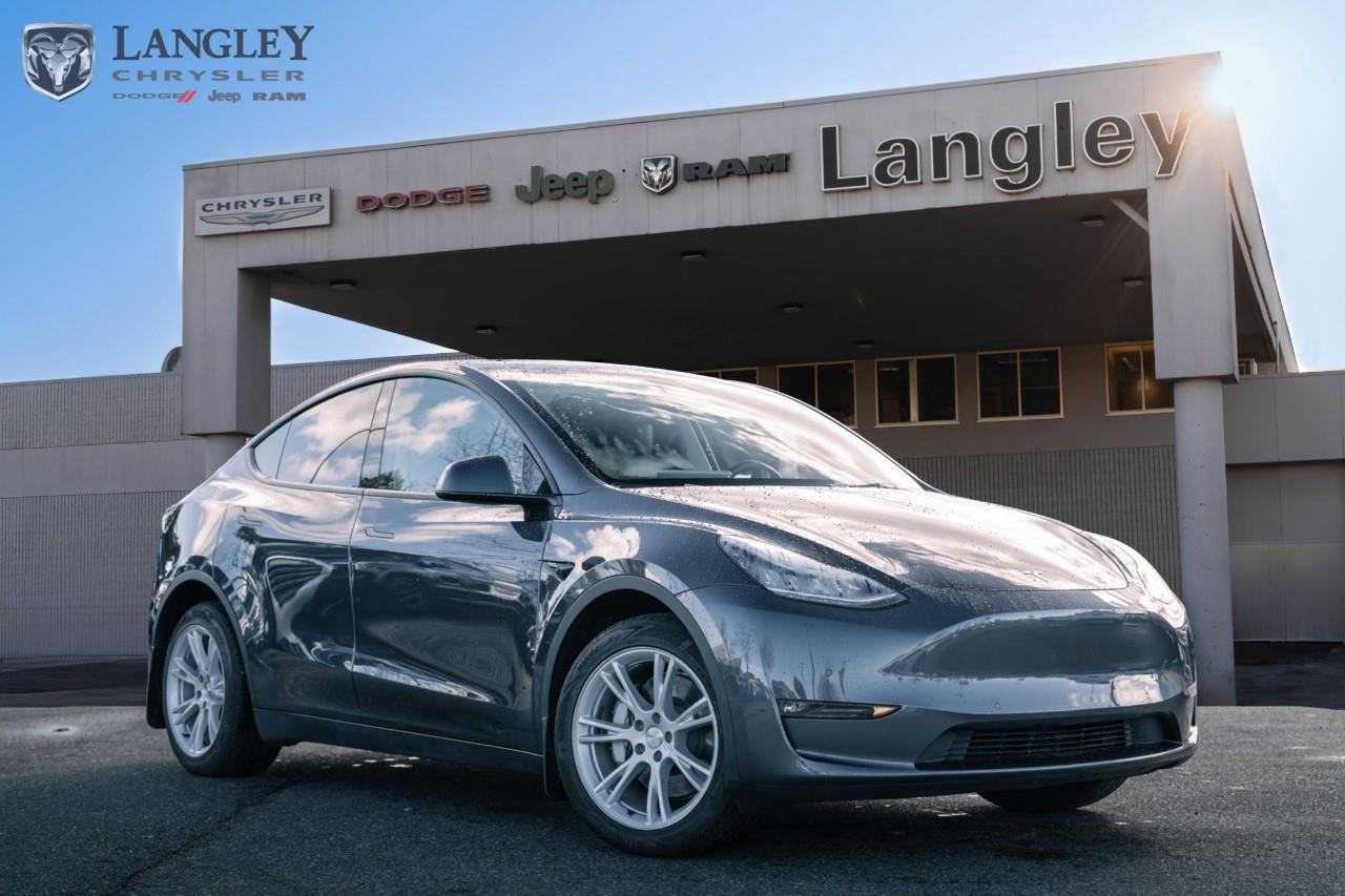 <p><strong>2022 TESLA MODEL Y LONG RANGE AWD</strong></p><p>The 2022 Model Y Long Range is an all-electric compact luxury SUV that pairs a high-efficiency dual-motor powertrain with standard all-wheel drive. Designed for versatility, it features a minimalist interior centered around a 15-inch touchscreen and offers expansive cargo space with a front trunk and fold-flat rear seating. </p><p></p><ul><li><p><strong>Powertrain</strong>: Dual-Motor Electric All-Wheel Drive (AWD) </p><p></p></li><li><p><strong>Horsepower</strong>: 384 hp</p></li><li><p><strong>Torque</strong>: 376 lb-ft</p></li><li><p><strong>0-100 km/h</strong>: 5.0 seconds</p></li><li><p><strong>Electric Range</strong>: Up to 531 km (EPA est.)</p></li><li><p><strong>Max Towing</strong>: Up to 3,500 lbs (1,588 kg) </p><p></p></li></ul><p>Come book a test drive at Langley Chrysler, conveniently located in Langley, British Columbia.</p>

<p>*All prices plus applicable taxes, applicable environmental recovery charges, documentation of $599 and full tank of fuel surcharge of $76 if a full tank is chosen. <br />Other protection items available that are not included in the above price:<br />Tire & Rim Protection and Key fob insurance starting from $599<br />Service contracts (extended warranties) for coverage up to 7 years and 200,000 kms starting from $599<br />Custom vehicle accessory packages, mudflaps and deflectors, tire and rim packages, lift kits, exhaust kits and tonneau covers, canopies and much more that can be added to your payment at time of purchase<br />Undercoating, rust modules, and full protection packages starting from $199<br />Financing Fee of $500 when applicable<br />Flexible life, disability and critical illness insurances to protect portions of or the entire length of vehicle loan</p>