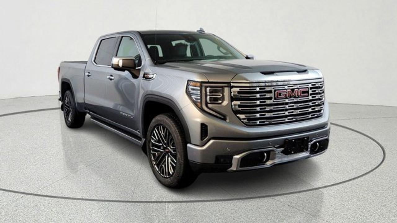 The 2026 GMC Sierra 1500 Denali with the 6.2-L EcoTec3 V8 delivers impressive performance, producing about 420 horsepower and 460 lb-ft of torque, paired with a 10-speed automatic transmission and featuring Dynamic Fuel Management for efficiency and strength. With the Denali Reserve Package, a sunroof, MultiPro power steps, a technology package including a rear-camera mirror and 15-inch multicolor head-up display are included. Visually and in ride presence, the 22-inch painted aluminum wheels with machining and bright chrome inserts set this trim apart, and the Jet Black Forge perforated leather interior with heated/ventilated front seats, as well as many comfort and driver assistance features rounds out the premium experience.