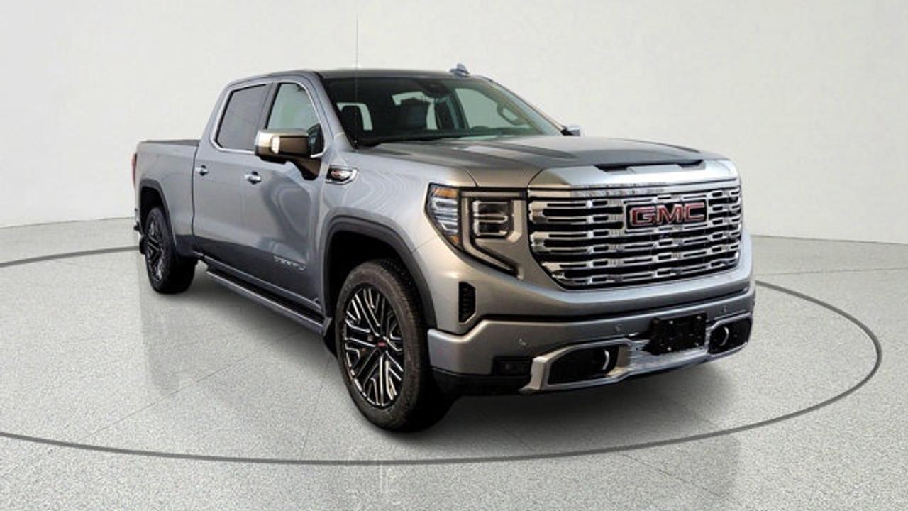 The 2026 GMC Sierra 1500 Denali with the 6.2-L EcoTec3 V8 delivers impressive performance, producing about 420 horsepower and 460 lb-ft of torque, paired with a 10-speed automatic transmission and featuring Dynamic Fuel Management for efficiency and strength. With the Denali Reserve Package, a sunroof, MultiPro power steps, a technology package including a rear-camera mirror and 15-inch multicolor head-up display are included. Visually and in ride presence, the 22-inch painted aluminum wheels with machining and bright chrome inserts set this trim apart, and the Jet Black Forge perforated leather interior with heated/ventilated front seats, as well as many comfort and driver assistance features rounds out the premium experience.