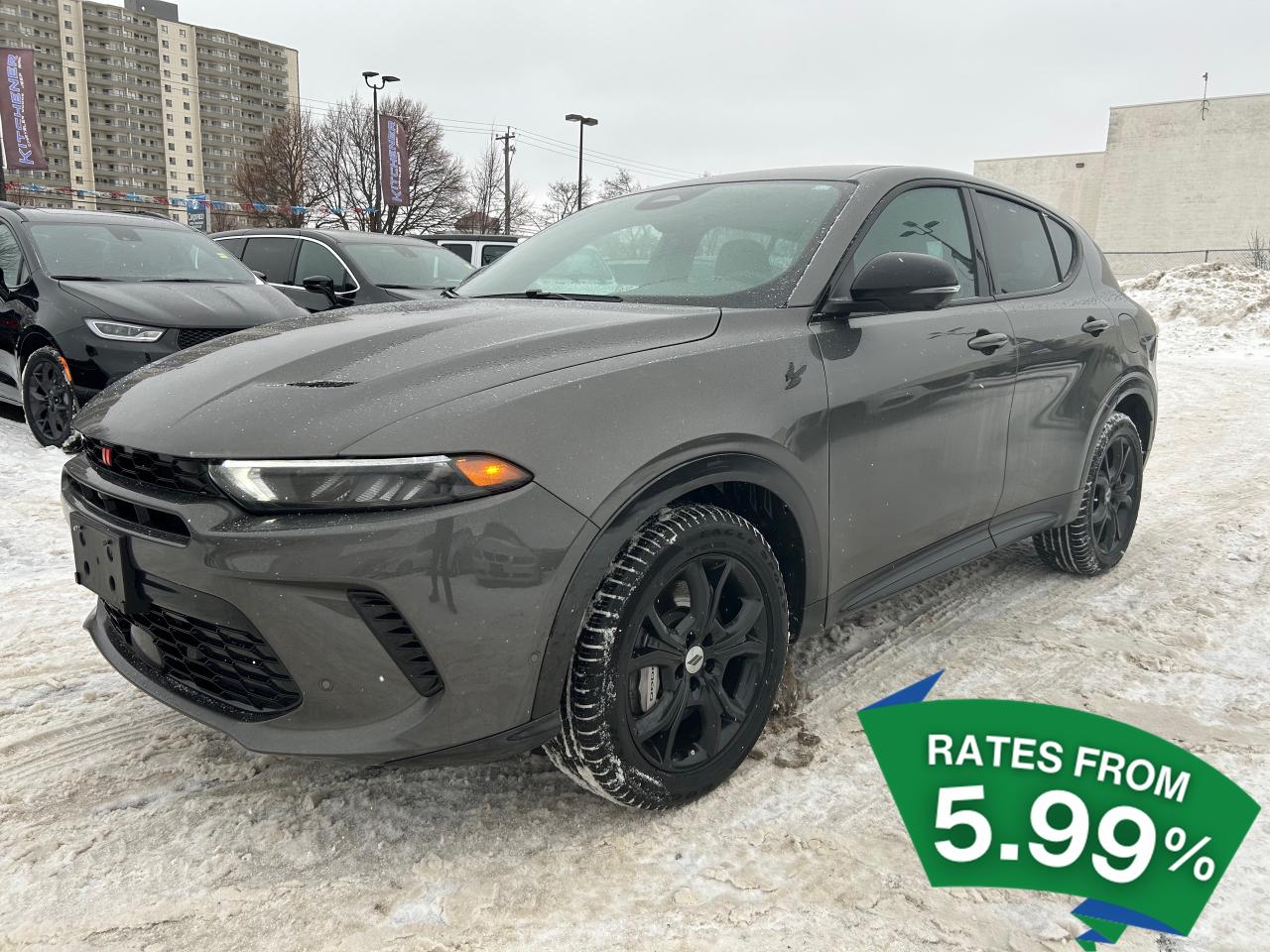 <p>Experience the Thrill of the Road with the 2024 Dodge Hornet R/T: Compact Power Meets Dynamic Design for the Adventurous Driver</p><p>The 2024 Dodge Hornet R/T is a compact sport utility vehicle crafted for those who crave excitement and precision on every drive. Beneath its sleek exterior, the Hornet R/T boasts a robust 1.3L 4-cylinder engine paired with a 6-speed automatic transmission, ensuring a smooth yet powerful performance. The all-wheel-drive system provides superior traction and control, making it an ideal companion for navigating diverse Canadian terrains, from urban streets to winding country roads.</p><p>Designed with the modern driver in mind, the Hornet R/T features the Quick Order Package 28B, offering a seamless blend of style and functionality. Its traction control system enhances safety, giving you the confidence to tackle any journey, regardless of weather conditions. The interior is a testament to comfort and innovation, with intuitive controls that keep you connected and in command.</p><p>Whether you're embarking on a weekend getaway or commuting through the city, the 2024 Dodge Hornet R/T delivers an exhilarating driving experience. This vehicle is more than just transportation; it's a statement of your adventurous spirit and a testament to Dodge's commitment to performance and quality.</p><p></p>&zwnj;