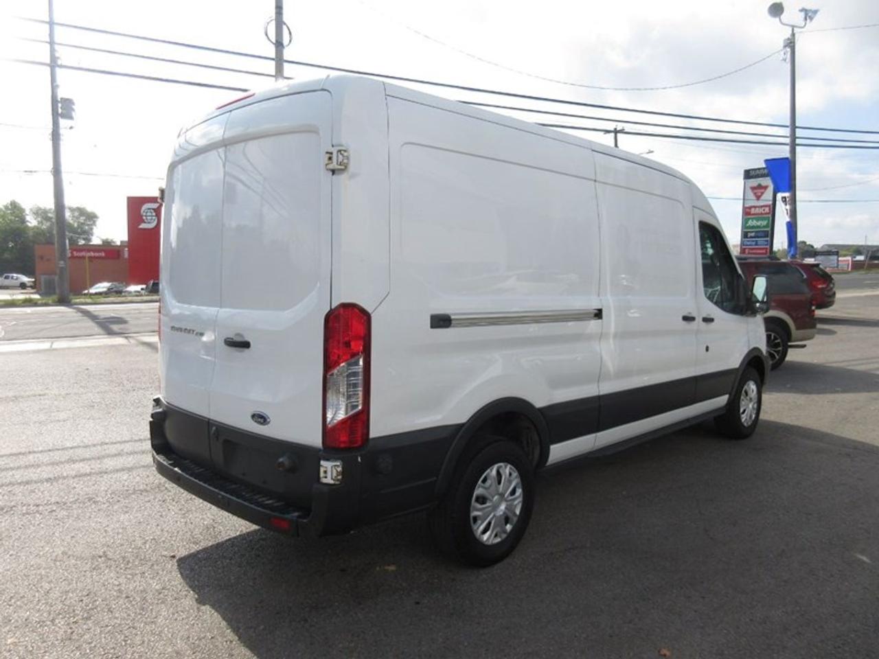 2016 Ford Transit 250 Van Med. Roof w/Sliding Pass. 148-in. WB Photo
