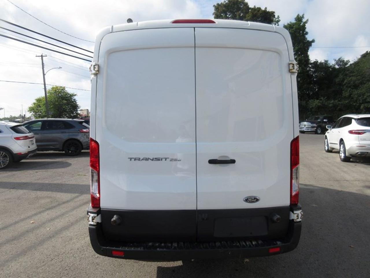 2016 Ford Transit 250 Van Med. Roof w/Sliding Pass. 148-in. WB Photo