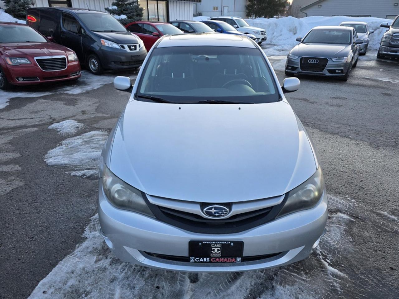 2011 Subaru Impreza 2.5L 4-CYLINDER ENGINE, SYMMETRICAL AWD Photo