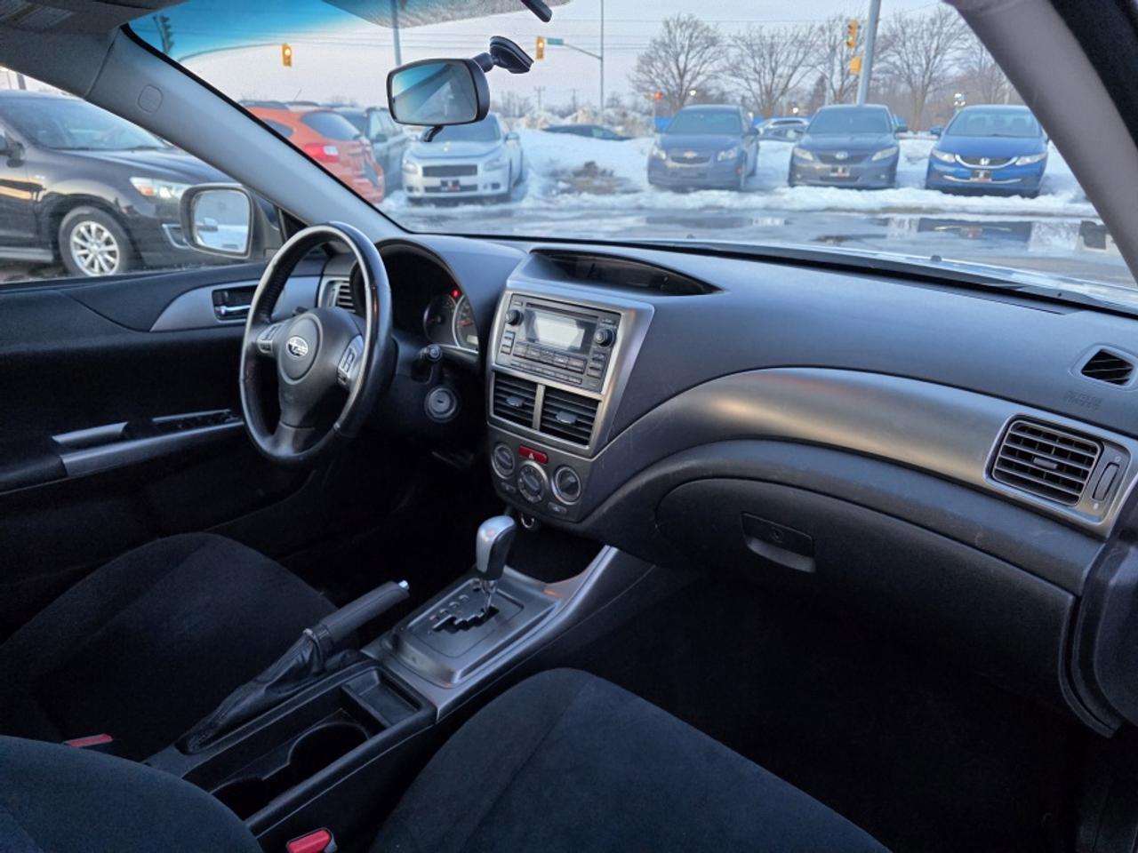 2011 Subaru Impreza 2.5L 4-CYLINDER ENGINE, SYMMETRICAL AWD Photo
