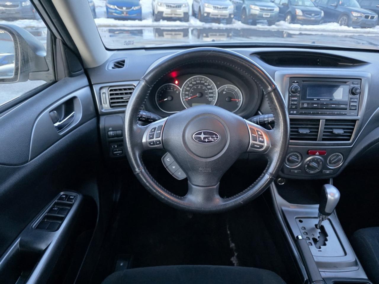 2011 Subaru Impreza 2.5L 4-CYLINDER ENGINE, SYMMETRICAL AWD Photo