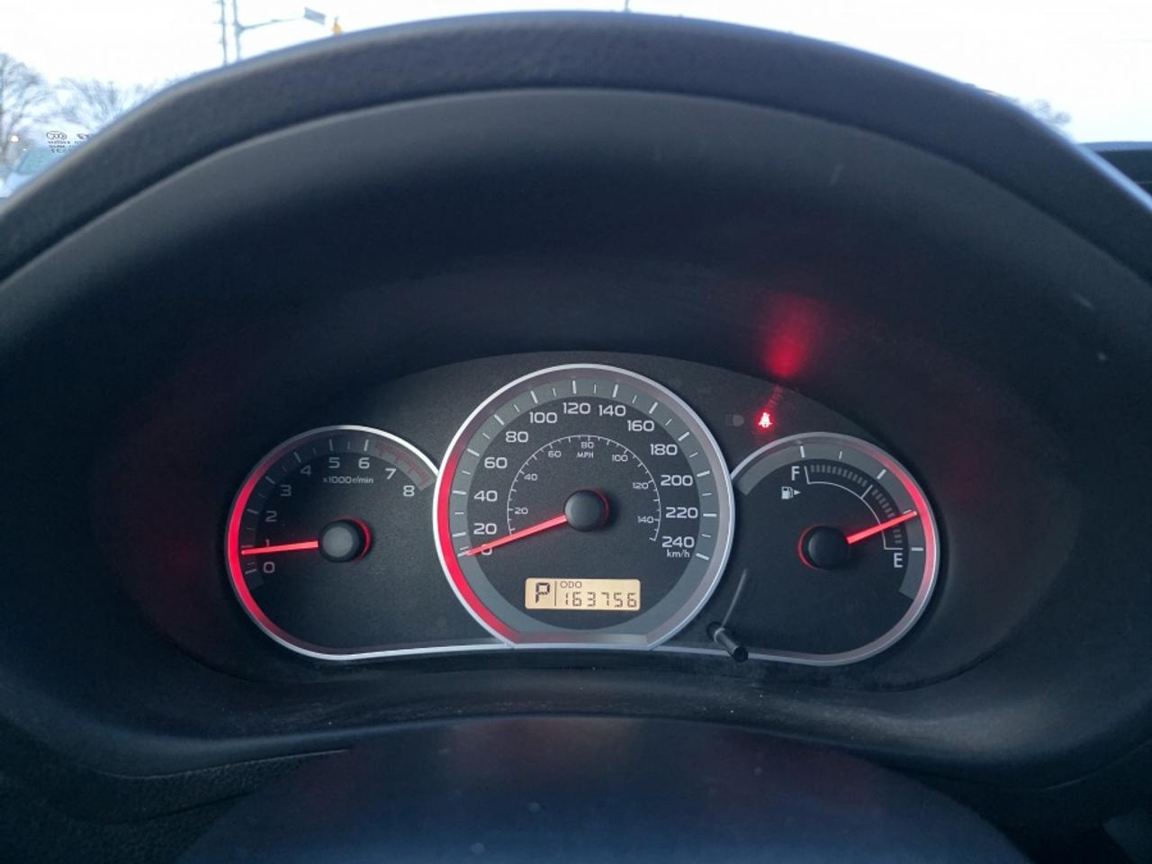 2011 Subaru Impreza 2.5L 4-CYLINDER ENGINE, SYMMETRICAL AWD Photo