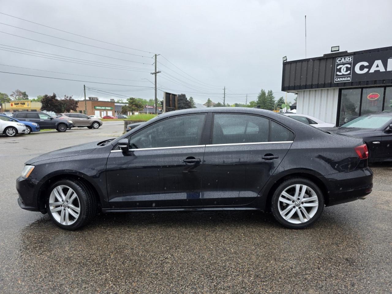 2016 Volkswagen Jetta ***LEATHER | NAVIGATION | SUNROOF | DRIVES GREAT!! Photo2