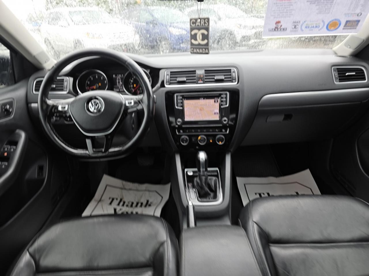 2016 Volkswagen Jetta ***LEATHER | NAVIGATION | SUNROOF | DRIVES GREAT!! Photo