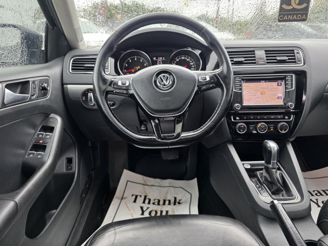 2016 Volkswagen Jetta ***LEATHER | NAVIGATION | SUNROOF | DRIVES GREAT!! Photo