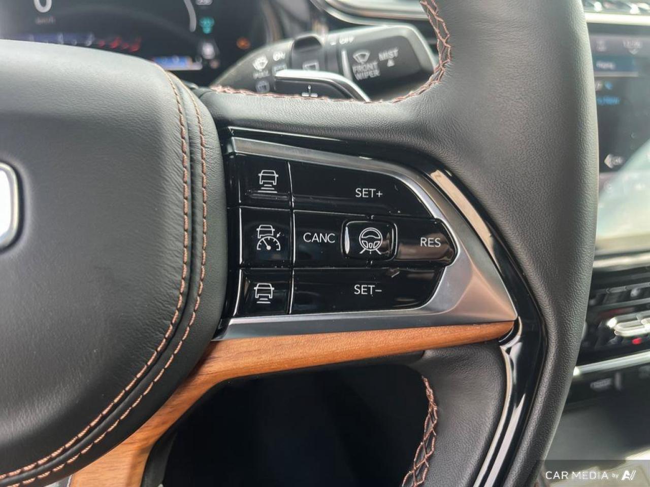 2023 Jeep Grand Cherokee 4xe Summit Reserve | Navigation | Leather | Sunroof | Remote Start | Rain Sensing Wipers | Photo