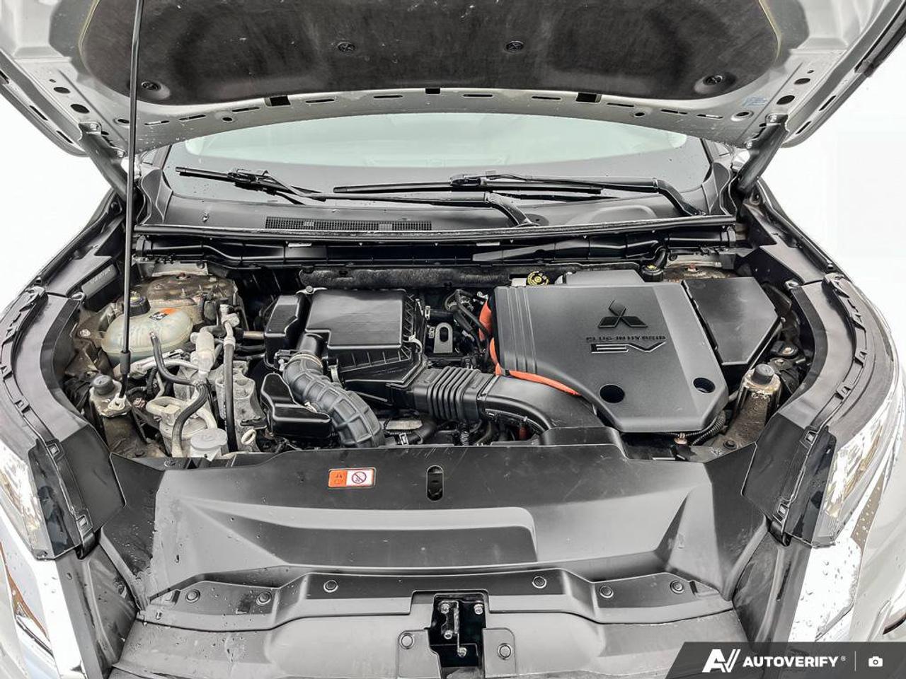 2024 Mitsubishi Outlander Plug-In Hybrid LE PHEV |Pano Roof | Leather | 7 Pass | Heated Seats + Steering | Adaptive Cruise |  & More! Photo
