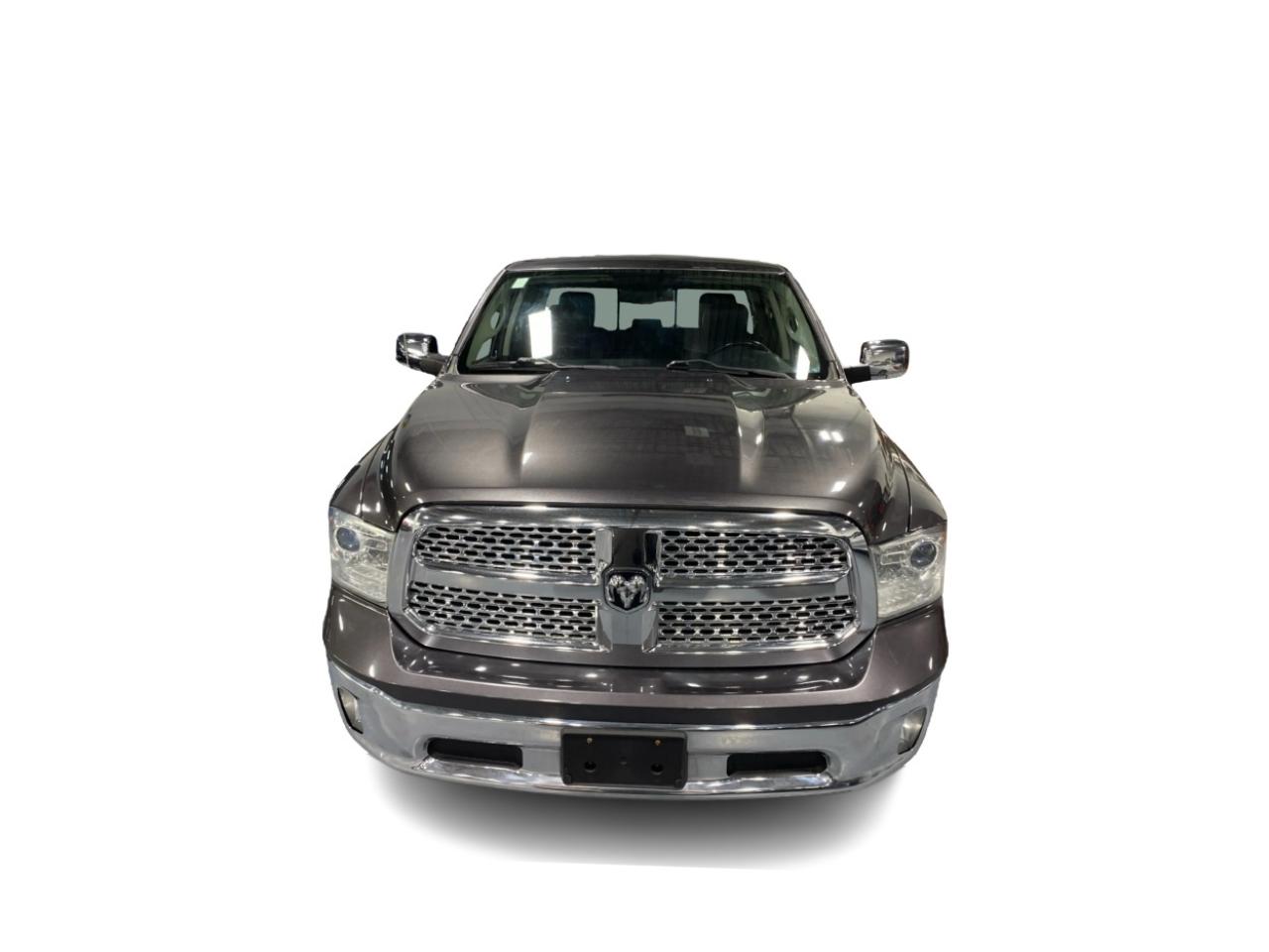 2016 RAM 1500 4WD Quad Cab 140.5" Laramie DIESEL Photo