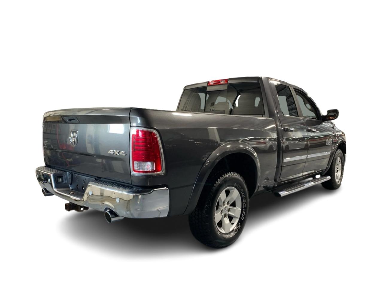 2016 RAM 1500 4WD Quad Cab 140.5" Laramie DIESEL Photo4