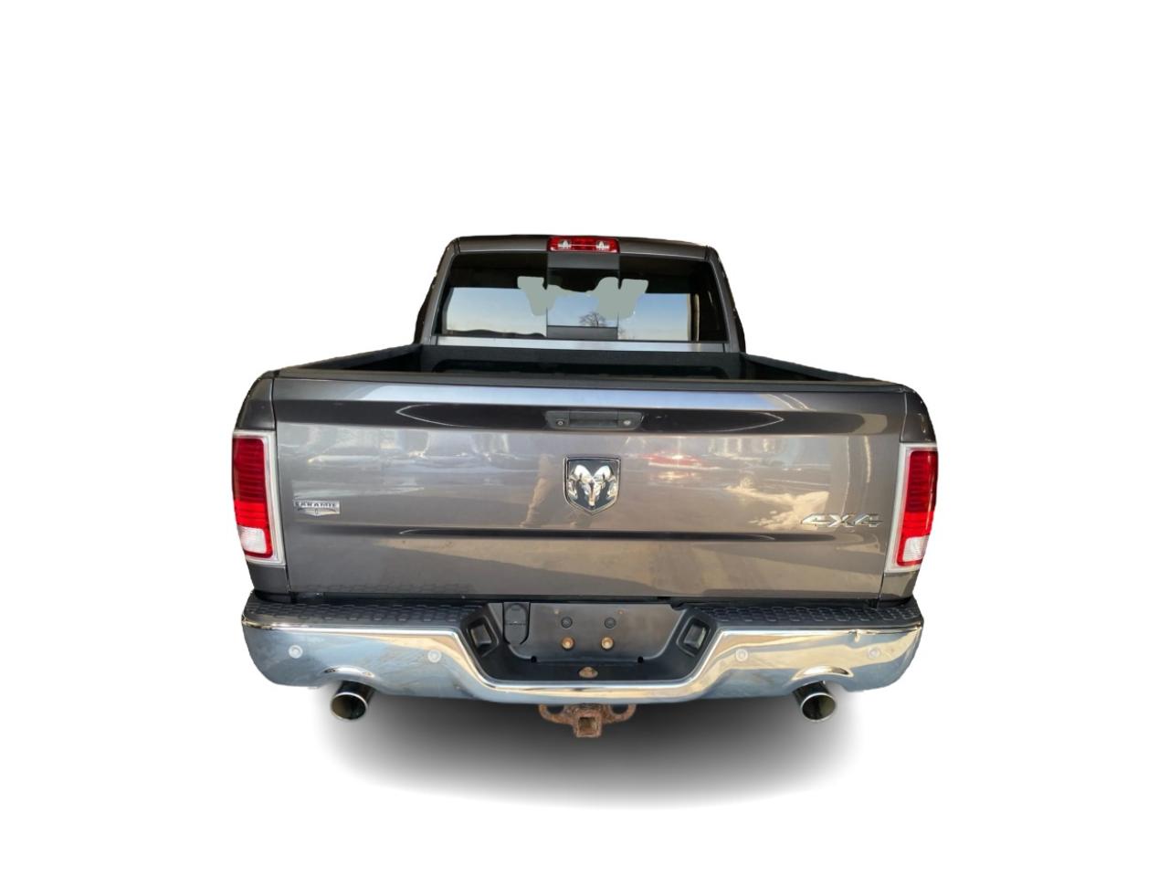 2016 RAM 1500 4WD Quad Cab 140.5" Laramie DIESEL Photo