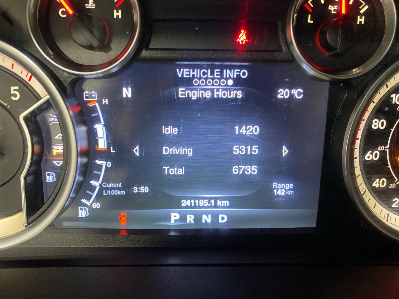 2016 RAM 1500 4WD Quad Cab 140.5" Laramie DIESEL Photo