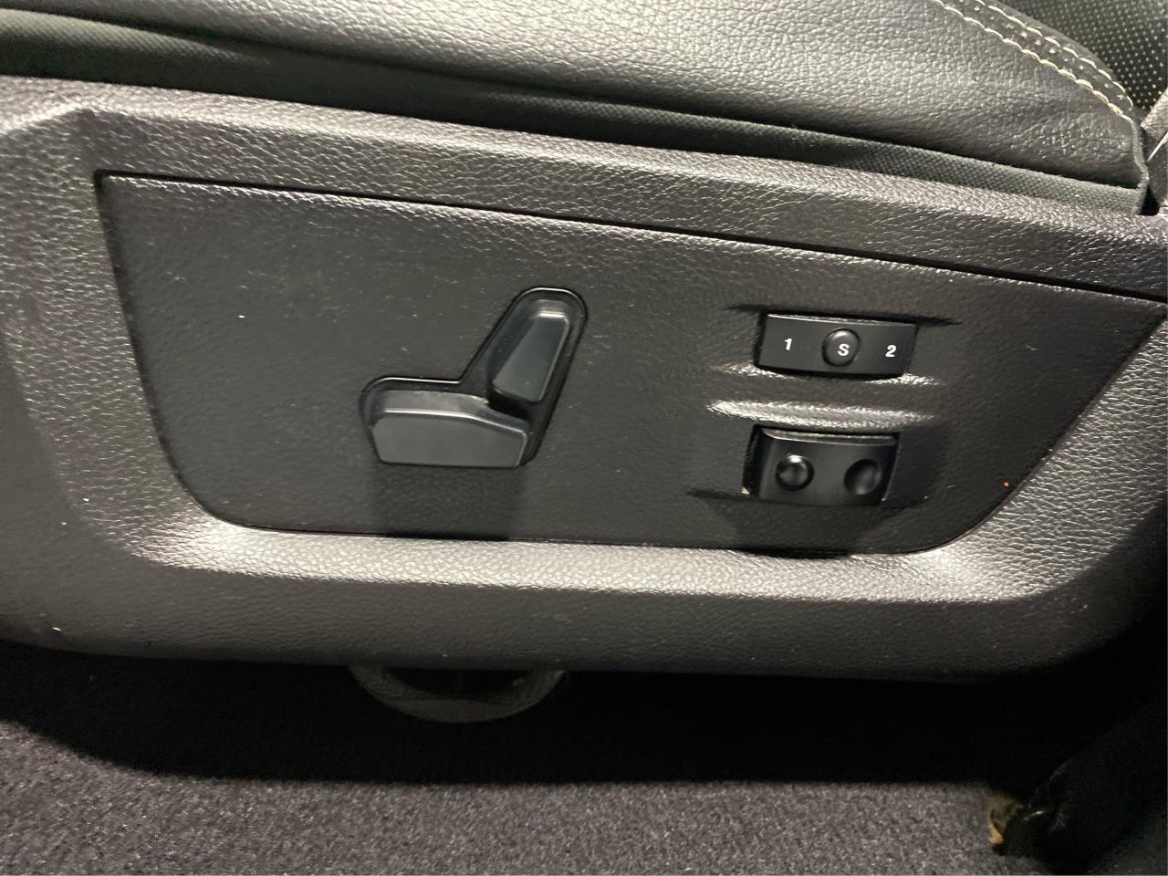 2016 RAM 1500 4WD Quad Cab 140.5" Laramie DIESEL Photo