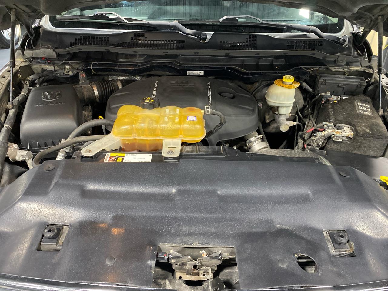 2016 RAM 1500 4WD Quad Cab 140.5" Laramie DIESEL Photo