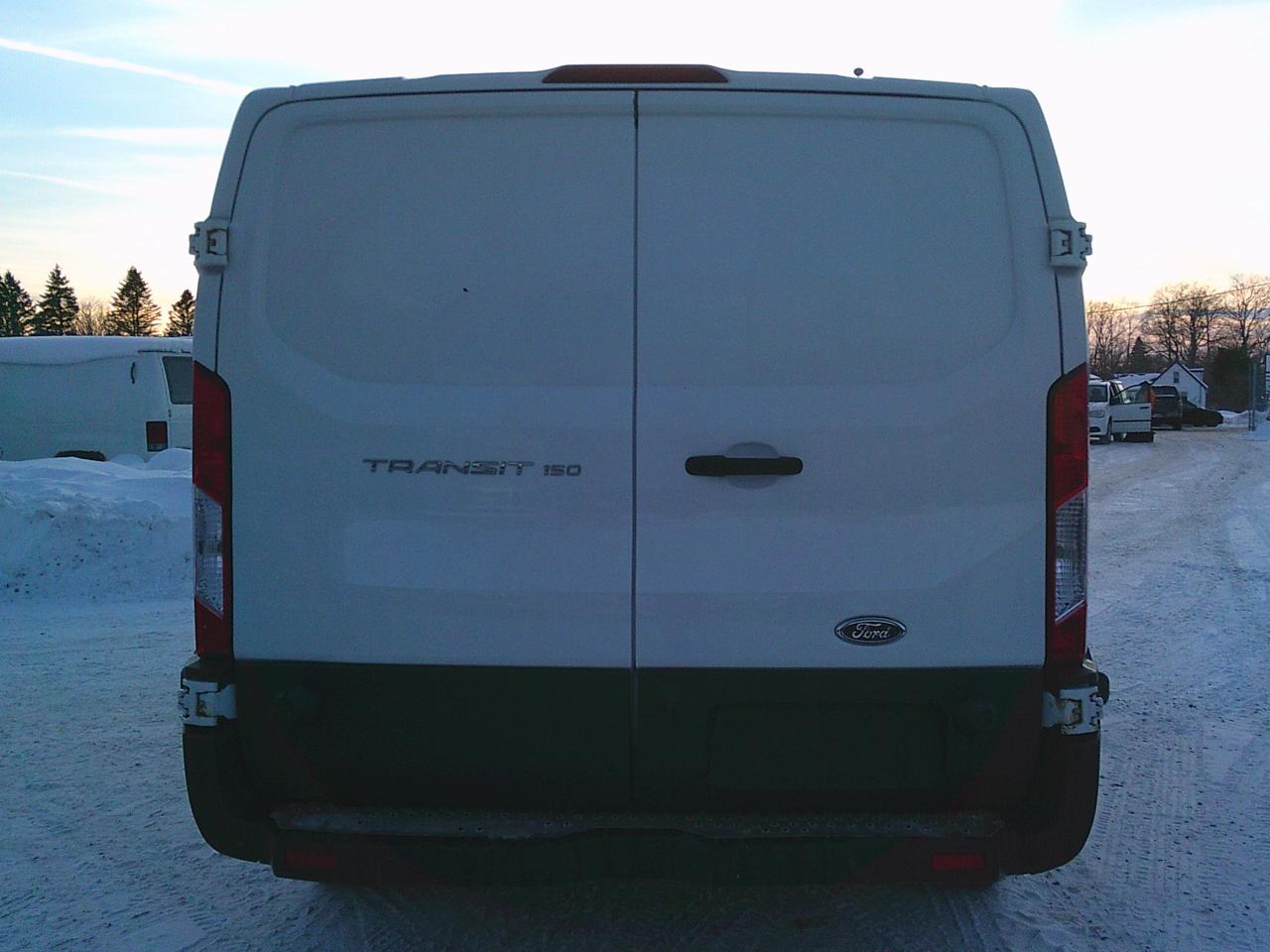 2017 Ford Transit Cargo Van T-150 148  Low Rf 8600 GVWR Sliding RH Dr Photo