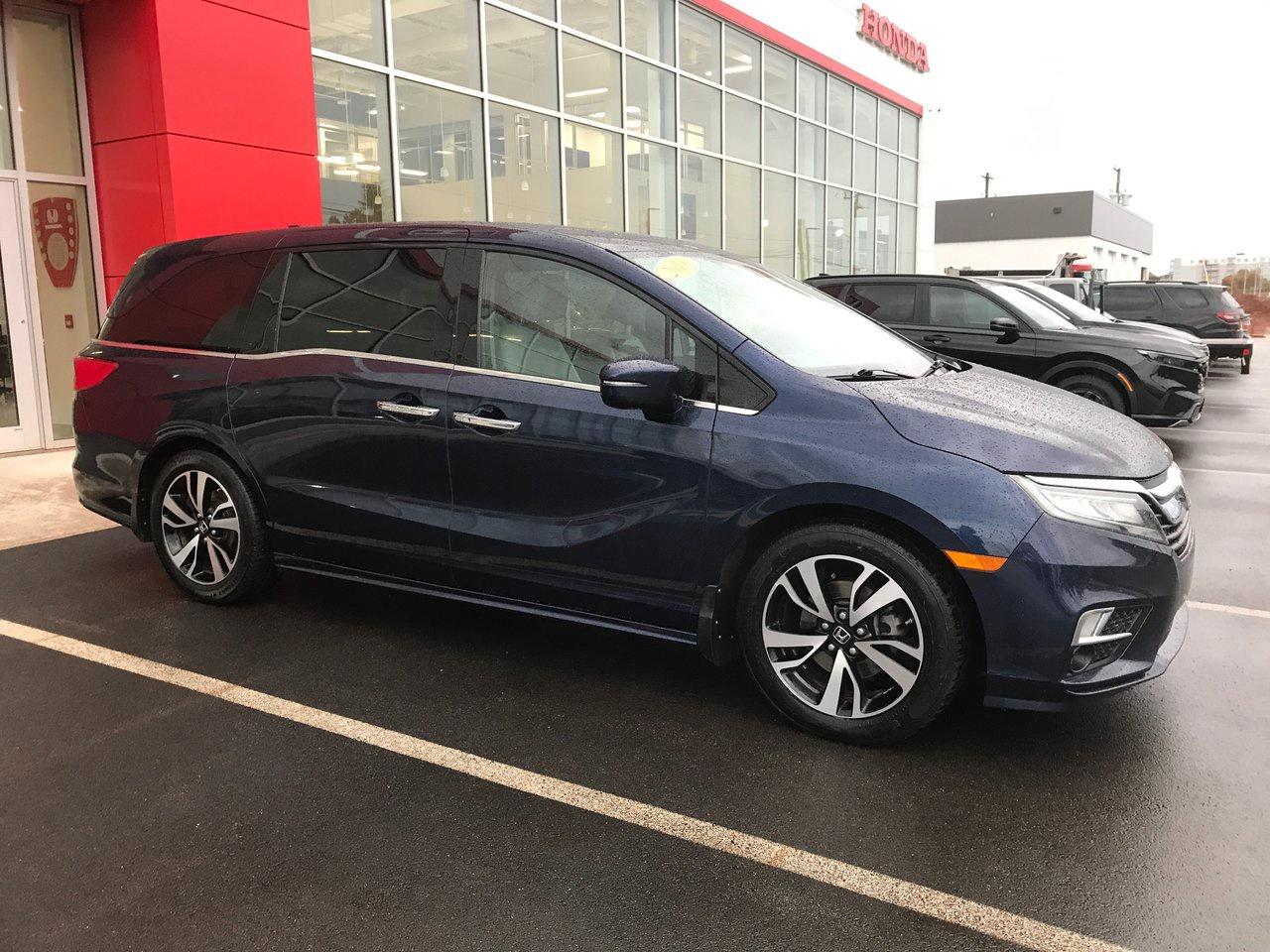 <span>When it comes to family transportation, the Honda Odyssey is the ultimate. And when it comes to Odysseys, this is the pinnacle. This is the 2018 Honda Odyssey Touring. (Want to hear a little secret? The Odyssey is also rather fun to drive.)</span>




<span>This 2018 Honda Odyssey Touring &ndash; rated to tow up to 3,500 pounds, able to seat 8, able to hold over 4,000 litres of cargo behind the front row &ndash; has the on-road behaviour of a midsize sedan. Powerful, with great handling and sharp steering, the V6-engined Odyssey is in another league. Plus its absolutely filled with great tech, convenience, comfort, and safety features.</span>




<span>The 2018 Odyssey Tourings upgrades are numerous. Start with the futuristic tech: CabinTalk in-car PA and CabinWatch rear seat monitor. Theres also wireless charging, a power tailgate, LED lighting, blind spot monitoring, rain-sensing wipers, and an 11-speaker 550-watt premium audio upgrade. The Odyssey Touring also adds comfort touches like ventilated front seats, ambient lighting, and acoustic front and rear door glass.&nbsp;</span>




<span>As if there wasnt already enough premium componentry. Standard features already included&nbsp;navigation, leather seating, front and rear parking sensors, an acoustic windshield, memory settings for the drivers power seat, and satellite radio compatibility. Theres a lot more, including tri-zone automatic climate control, power sliding doors, a sunroof, integrated second-row sunshades, heated front seats, a 12-way power drivers seat, and the HondaVAC in-van vacuum.</span>




<span>And, well, theres a lot more beyond that: proximity access/pushbutton start, a multi-angle rearview camera, a power passenger seat, Apple CarPlay/Android Auto, auto high beams, and the brilliant Magic Slide second row seat that makes the 2018 Odyssey the most flexible van on the market. Honda Sensing is standard, too, with adaptive cruise control, lane keeping assist, forward collision warning, and more.</span>




<span style=font-weight: 400;>Thank you for your interest in this vehicle. Its located at Centennial Honda, 610 South Drive, Summerside, PEI. We look forward to hearing from you; call us toll-free at 1-902-436-9158.</span>