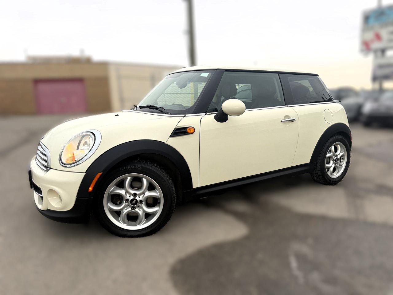 <p><span style=color:black;>2013 MINI Cooper Automatic Knightsbridge Edition - Come check out this fully certified eco-friendly hatchback that comes nicely equipped and powered by a fuel efficient 4cly 1.6L Automatic Transmission , Bluetooth Phone w/ Mini Media Connect Interface, Headlamps w/Cleaning system & front-rear fog lamps, Keyless Access with push button start, Dual Panoramic Sunroofs, A/C, 16 Mini 4-Hole Circular Silver Spoke Alloy wheels, Speed Sensing Wipers, Multi-Function 3-spoke sport steering wheel w/Tilt & Telescopic, Finished in Pepper White w/Carbon Black heated front seats and more! You will love the added safety and worry free winter driving with FWD w/Dynamic Stability Control will bring you in the long Alberta winters & unpredictable summers, Experience Minis legendary performance/safety and fuel economy *BUY WITH CONFIDENCE* as every vehicle has guaranteed title with available warranty and includes a copy of the extensive Mechanical Fitness Assessment (MFA) & CarFax history report</span> <a target=_blank rel=noopener noreferrer href=https://vhr.carfax.ca/?id=YH2stc7IDGw4JHyWV0YOUbmwlh7StPLp>https://vhr.carfax.ca/?id=YH2stc7IDGw4JHyWV0YOUbmwlh7StPLp</a><span style=color:black;><span></span>Must See, 172,193 Kms, priced at $6,995.00,<span style=font-family:Cambria,serif;>for additional inventory listings & verifiable customer reviews visit or like us on our Facebook business page at </span></span><a target=_blank rel=noopener noreferrer href=https://nam12.safelinks.protection.outlook.com/?url=https%3A%2F%2Fwww.facebook.com%2FBCWLUXURY%2F&data=05%7C01%7C%7C49037207e269409d393408da2abbf030%7C84df9e7fe9f640afb435aaaaaaaaaaaa%7C1%7C0%7C637869283919776206%7CUnknown%7CTWFpbGZsb3d8eyJWIjoiMC4wLjAwMDAiLCJQIjoiV2luMzIiLCJBTiI6Ik1haWwiLCJXVCI6Mn0%3D%7C3000%7C%7C%7C&sdata=KT5A32yHJFN2iw5utjLCQnk2B12DF0kAGQ4FVcFdstY%3D&reserved=0><span style=color:blue;><span style=font-family:Cambria,serif;>https://www.facebook.com/BCWLUXURY/</span></span></a><span style=color:black;><span style=font-family:Cambria,serif;> and</span></span><a target=_blank rel=noopener noreferrer href=https://nam12.safelinks.protection.outlook.com/?url=https%3A%2F%2Fbcwautomotivegroup.ca%2F%3Ffbclid%3DIwAR0BpruHlLGj0bASp1TtpvTWld8NYwhx8iXN7GeX8oBJAjoj1eu9MiL3Hro&data=05%7C01%7C%7C49037207e269409d393408da2abbf030%7C84df9e7fe9f640afb435aaaaaaaaaaaa%7C1%7C0%7C637869283919776206%7CUnknown%7CTWFpbGZsb3d8eyJWIjoiMC4wLjAwMDAiLCJQIjoiV2luMzIiLCJBTiI6Ik1haWwiLCJXVCI6Mn0%3D%7C3000%7C%7C%7C&sdata=bTyqHcnwT8yMEAO3lgvdGqBhWK4kHZBLbvvf7rmyXQU%3D&reserved=0><span style=color:blue;><span style=background:white;border:none windowtext 1.0pt;font-family:inherit;font-size:11.5pt;padding:0cm;>https://bcwautomotivegroup.ca/</span></span></a><span style=color:black;><span style=font-family:Cambria,serif;>BCW Automotive Group is your Mini Cooper Specialist! Now is the time to join the charismatic club of Mini Owners. Ph 403-606-9008 to make an appointment most anytime for your personalized viewing (including holidays/evenings & weekends) to serve you best by appointment only!We Know You Will Enjoy Your Test Drive Towards Ownership! AMVIC Licensed Dealer</span></span><span style=color:#050505;><span style=background:white;font-family:Cambria,serif;font-size:11.5pt;>Stock #PWA13.</span></span><span style=color:black;><o:p></o:p></span></p><p></p>