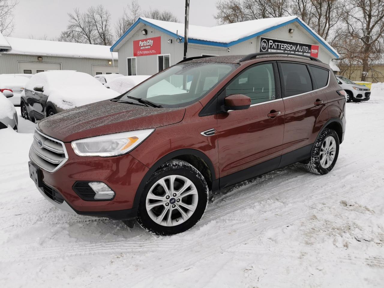 CLEAN CARFAX - 1.5L AWD - WE FINANCE Adventure awaits in the 2018 Ford Escape SEL 4WD, now available at Patterson Auto Sales. This pre-owned SUV combines versatility and style with its sleek design and confident stance. Powered by a fuel-efficient 1.5L L4 DOHC 16V engine, the Escape delivers a smooth, responsive drive whether youre navigating city streets or heading off the beaten path. Enjoy premium features, all-wheel capability, and ample cargo spaceperfect for families, commuters, and weekend explorers alike. Drive home reliability, comfort, and performance today with the 2018 Ford Escape SEL 4WD.