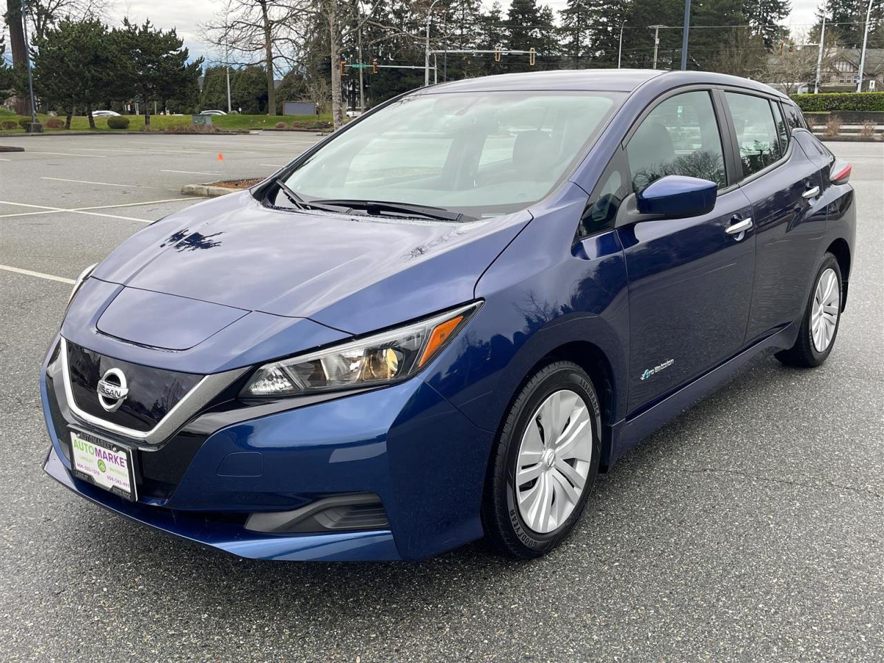 EXCEPTIONALLY CLEAN WITH VERY VERY LOW KM'S. COMES WITH 2 CHARGING PORTS AND YOU WILL LOVE OUR FINANCING OPTIONS!<br /><br />Welcome to the Automarket, your community financing dealership of "YES". We are featuring a very clean and beautiful Nissan Leaf with ony 52,000km. This car is very well equiped and has no accident declarations.<br /><br />Ask about or amazing finance options This vehicle has been Fully Inspected, Certified and Qualifies for Our Free Extended Warranty.Don't forget to ask about our Great Finance and Lease Rates. We also have a Options for Buy Here Pay Here and Lease to Own for Good Customers in Bad Situations. 2 locations to help you, White Rock and Langley. Be sure to call before you come to confirm the vehicles location and availability or look us up at www.automarketsales.com. White Rock 604-542-4970 and Langley 604-533-1310. Serving Surrey, Delta, Langley, Richmond, Vancouver, all of BC and western Canada. Financing & leasing available. CALL SK AUTOMARKET LTD. 6045424970. Call us toll-free at 1 877 813-6807. $999 Documentation fee (negotiable) and applicable taxes are in addition to advertised prices. LANGLEY LOCATION DEALER# 40038 S. SURREY LOCATION DEALER #9987<br />