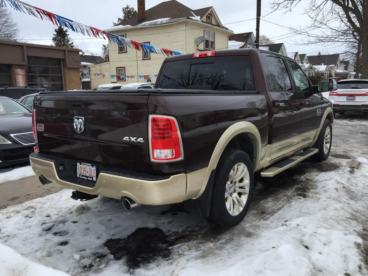 2015 RAM 1500 4WD Crew Cab Laramie Longhorn All Service History Photo