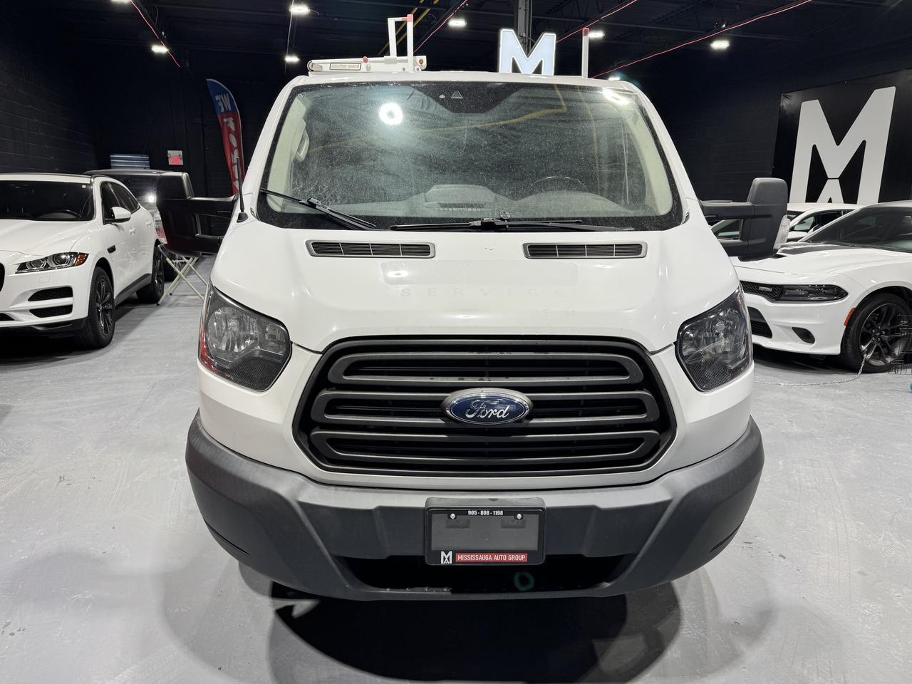 2017 Ford Transit Cargo Van T-250 130" Low Rf 9000 GVWR Sliding RH Dr Photo