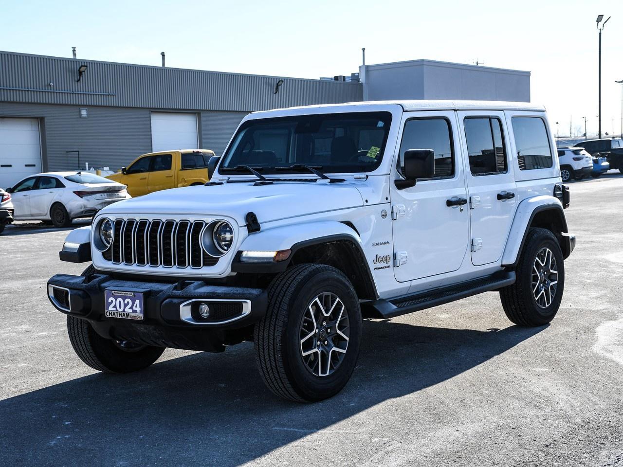 Meet Sawyer.<br /><br />A 2024 Jeep Wrangler Unlimited Sahara, finished in Bright White Clearcoat and showing just 35,160 km. Sawyer is the kind of Wrangler that balances adventure with refinement, equally at home on a gravel road, a snowy highway, or pulling up somewhere nice with the doors still on.<br /><br />He's confident without being wild.<br />Capable without being rough around the edges.<br />A Wrangler that knows how to clean up well.<br /><br />Trail-Ready DNA, Everyday Manners<br /><br />Under the hood, Sawyer runs a 2.0L turbocharged engine paired with a smooth 8-speed automatic transmission and true 4WD. The result is confident power, quick response, and excellent on-road composure without giving up that unmistakable Jeep capability.<br /><br />He's built to explore, but he's also built to commute.<br />That's the Sahara difference.<br /><br />Comfort That Goes Further Than the Pavement<br /><br />Inside, Sawyer proves that rugged doesn't have to mean bare-bones:<br /><br />Heated front seats<br />Heated steering wheel<br />Dual-zone automatic climate control<br />Front bucket seats with excellent visibility<br />Body-colour 3-piece hardtop with Freedom Panels<br /><br />You get the open-air Jeep experience when you want it and quiet, comfortable cruising when you don't.<br /><br />Modern Tech, Jeep Style<br /><br />Sawyer is equipped with the kind of tech that makes every drive easier:<br /><br />Uconnect 5 with massive 12.3''' touchscreen<br />SiriusXM with 360L<br />4G LTE Wi-Fi Hot Spot<br />ParkView rear back-up camera<br />Steering wheel-mounted audio controls<br /><br />Everything feels current, intuitive, and well-integrated exactly what you want in a modern Wrangler.<br /><br />Sahara Presence<br /><br />The Sahara trim gives Sawyer his polished look:<br /><br />18''' machine-painted grey alloy wheels<br />Body-colour hardtop for a clean, upscale finish<br />Diamond-plate side steps<br />Classic Wrangler stance with refined details<br /><br />He looks ready for adventure without looking like he lives permanently in the mud.<br /><br />Why Sawyer Works<br /><br />Low mileage for the model year<br />True 4WD confidence<br />Turbo efficiency with everyday drivability<br />Comfort-focused Sahara trim<br />A Wrangler that fits real life, not just weekends<br /><br />Sawyer isn't the loudest Wrangler in the room.<br />He doesn't need to be.<br /><br />He's capable.<br />He's composed.<br />He's the kind of Jeep you can live with every day and still take anywhere.<br /><br />Find Sawyer at Chatham Chrysler,<br />where adventure always comes with a personality.<br /><br />Here at Chatham Chrysler, our Financial Services Department is dedicated to offering the service that you deserve. We are experienced with all levels of credit and are looking forward to sitting down with you. Chatham Chrysler Proudly serves customers from London, Ridgetown, Thamesville, Wallaceburg, Chatham, Tilbury, Essex, LaSalle, Amherstburg and Windsor with no distance being ever too far! At Chatham Chrysler, WE CAN DO IT!
