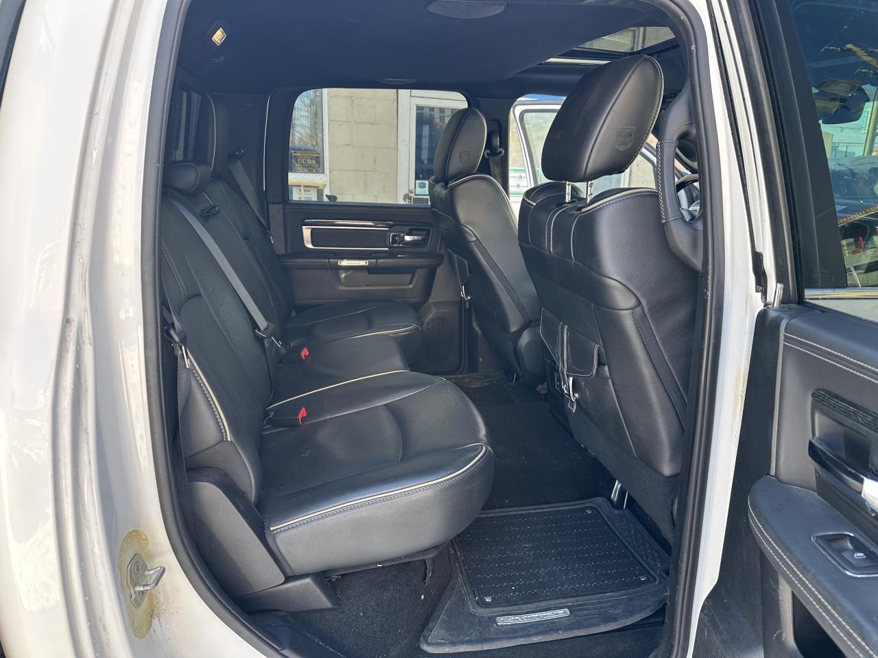 2015 RAM 1500 4WD Crew Cab 140.5" Laramie Ltd 2.0 Photo