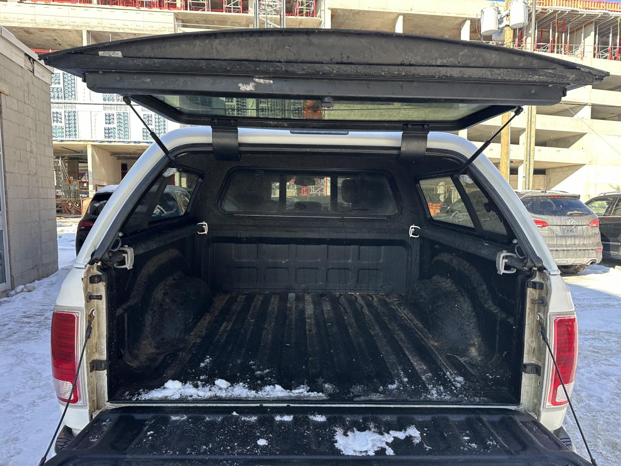 2015 RAM 1500 4WD Crew Cab 140.5" Laramie Ltd 2.0 Photo