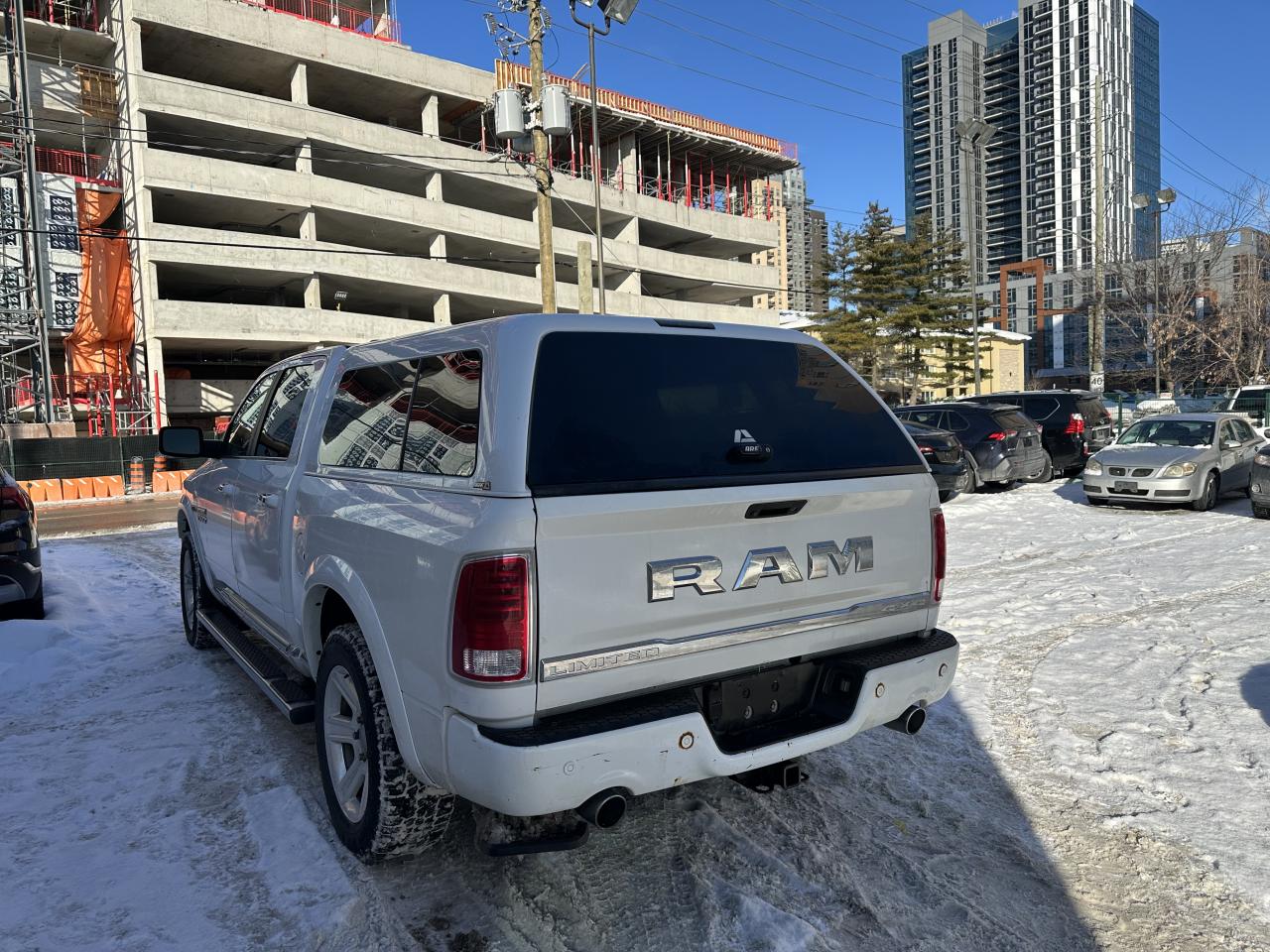 2015 RAM 1500 4WD Crew Cab 140.5" Laramie Ltd 2.0 Photo